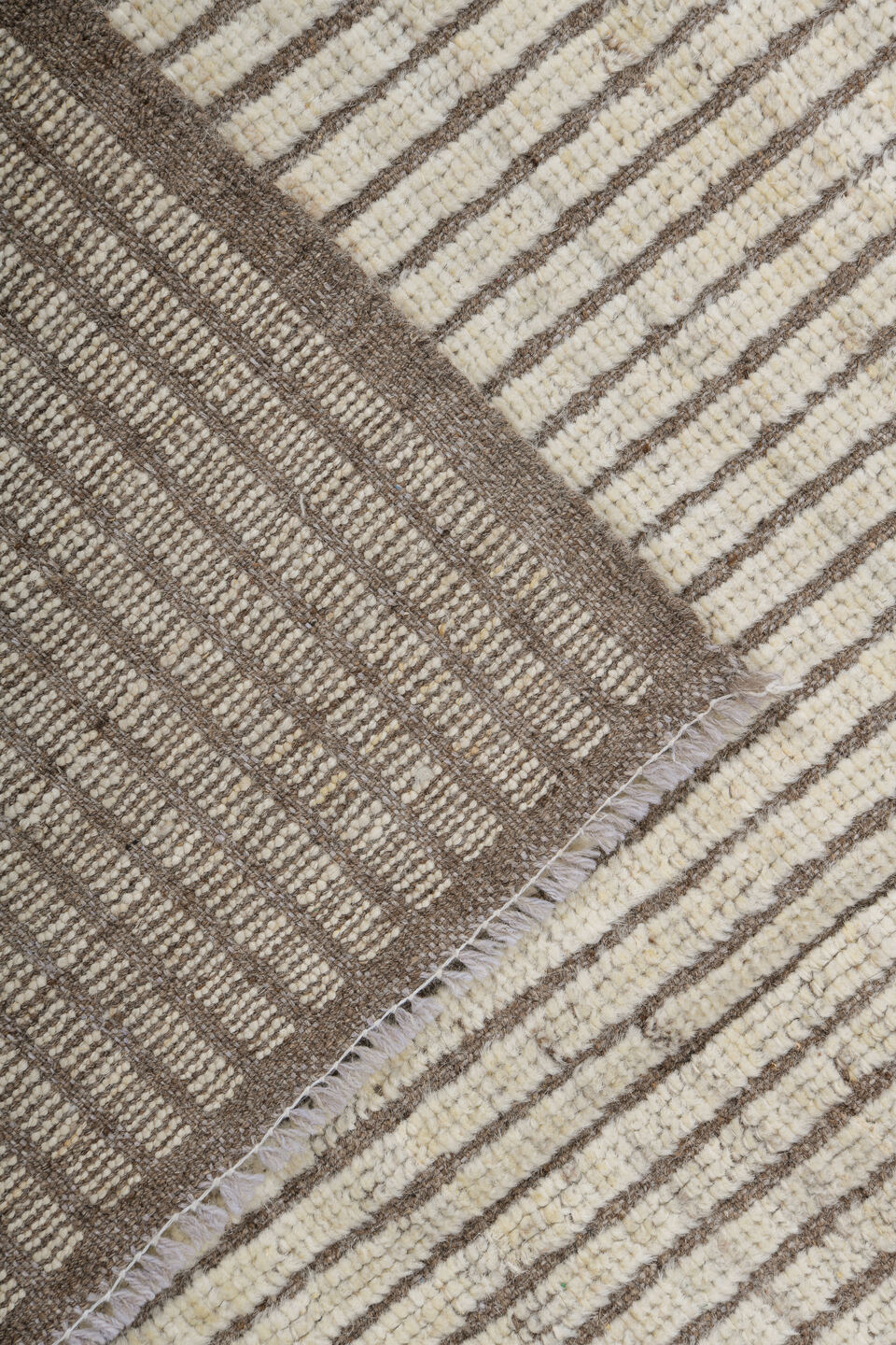 5' x 8' one-of-a-kind handmade vintage Tulu medium size rug. Color palette: ivory, taupe, brown, cream, beige, gray