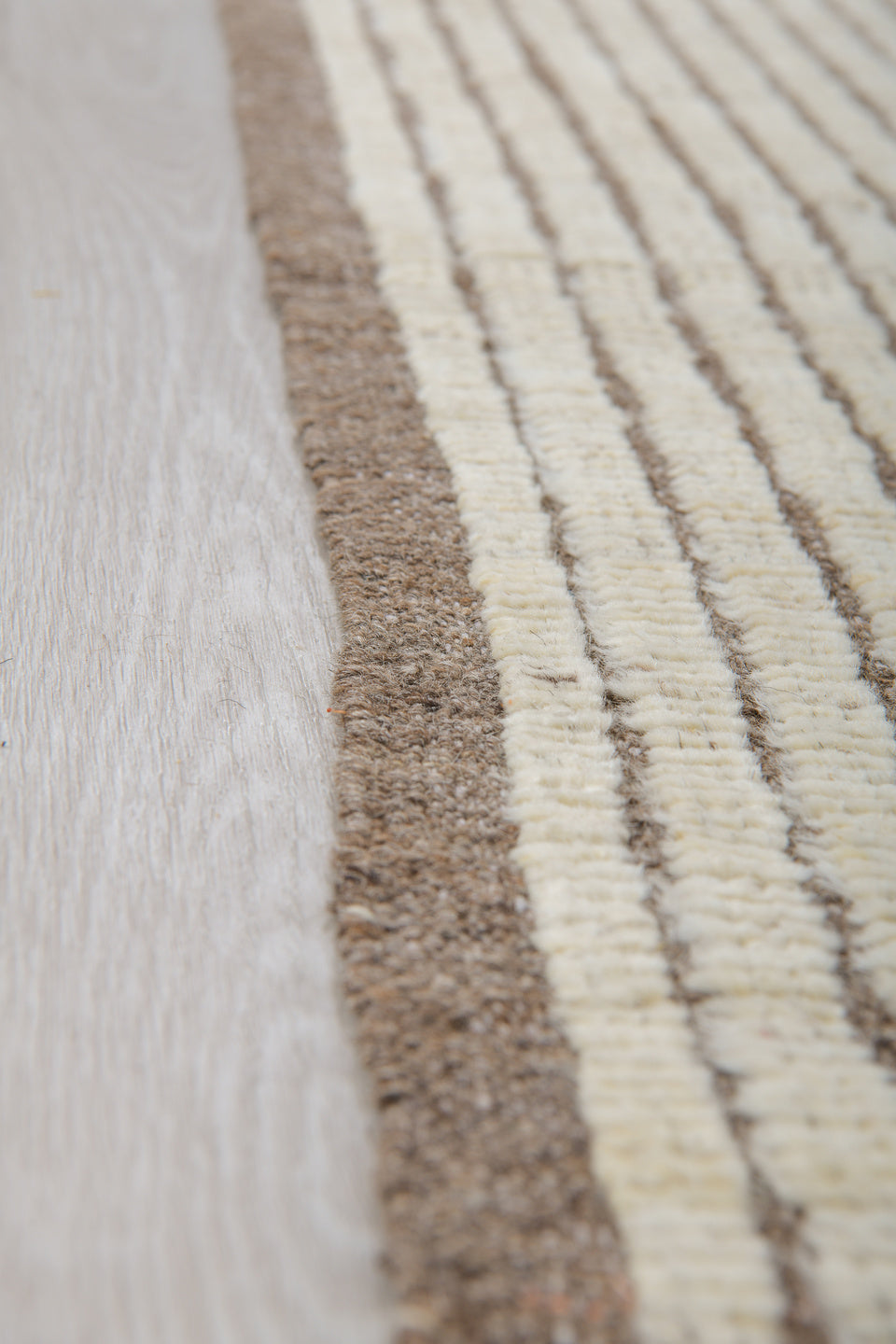 5' x 8' one-of-a-kind handmade vintage Tulu medium size rug. Color palette: ivory, taupe, brown, cream, beige, gray
