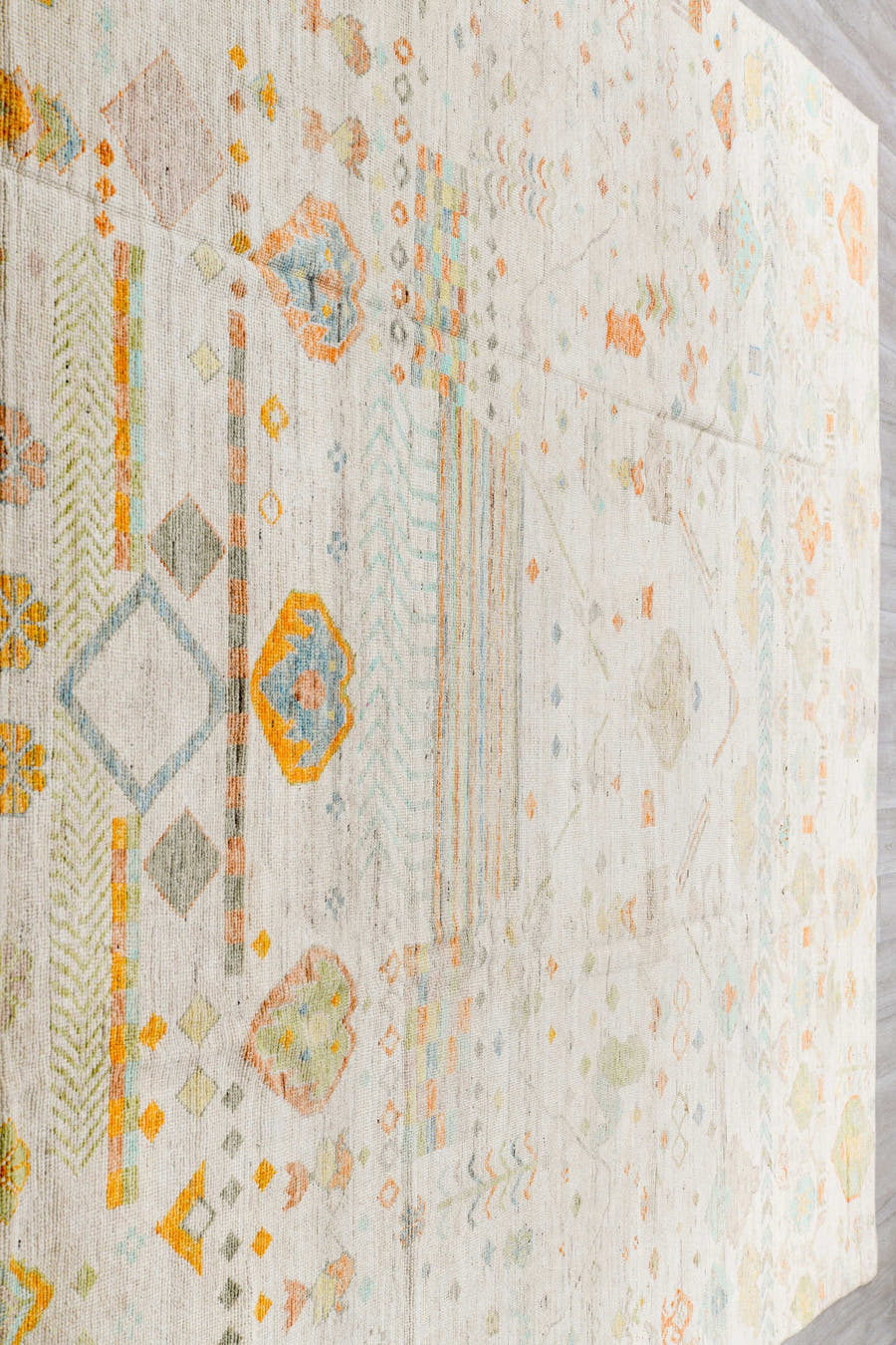 10' x 14' one-of-a-kind handmade vintage Tulu large size rug. Color palette: ivory, sage, aqua, apricot, taupe, pale gold