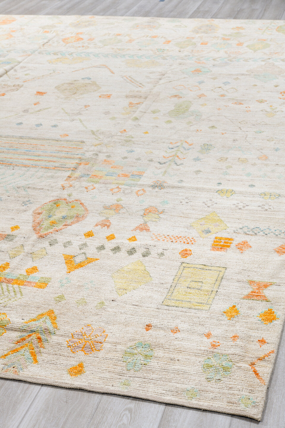 10' x 14' one-of-a-kind handmade vintage Tulu large size rug. Color palette: ivory, sage, aqua, apricot, taupe, pale gold
