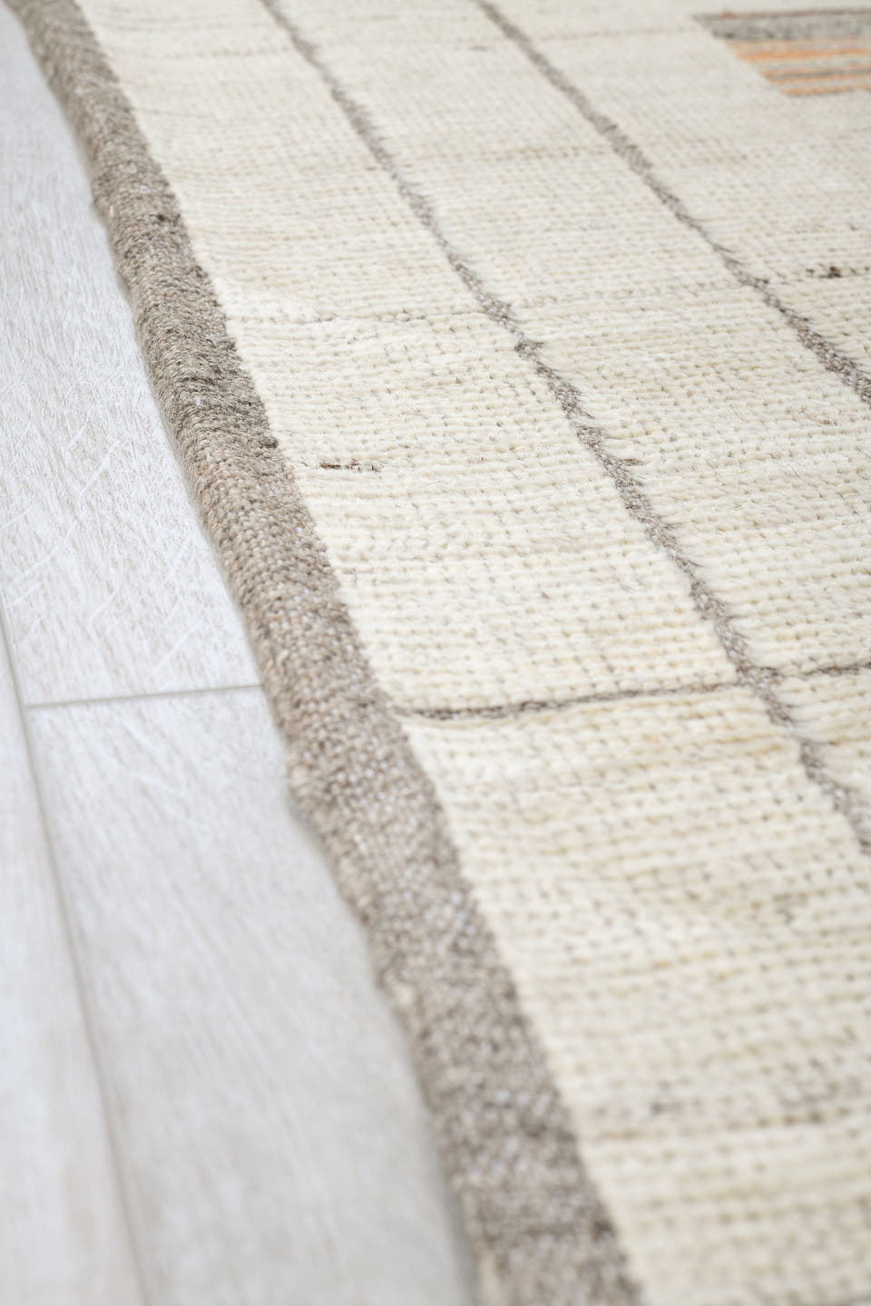 7' x 10' one-of-a-kind handmade vintage Tulu large size rug. Color palette: ivory, taupe, charcoal, camel, sky_blue, rose