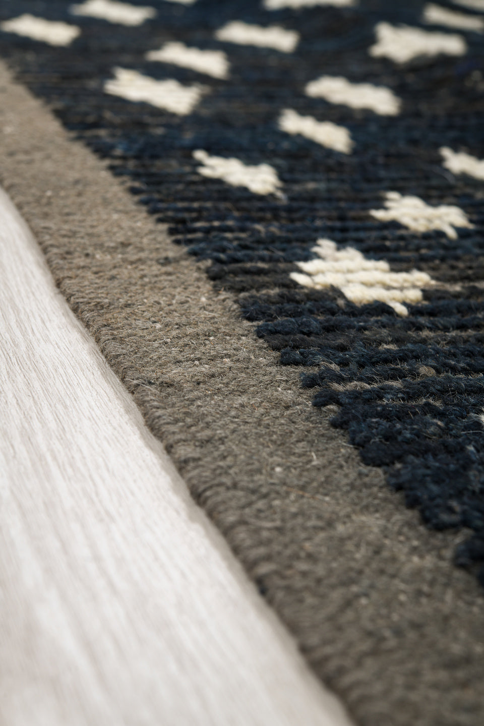 11' x 13' one-of-a-kind handmade vintage Tulu oversize rug. Color palette: charcoal, ivory, slate, blue gray, taupe, black
