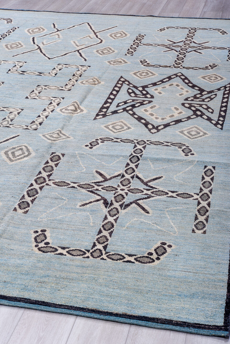 9' x 12' one-of-a-kind handmade vintage Tulu large size rug. Color palette: sky blue, charcoal, ivory, slate, light blue