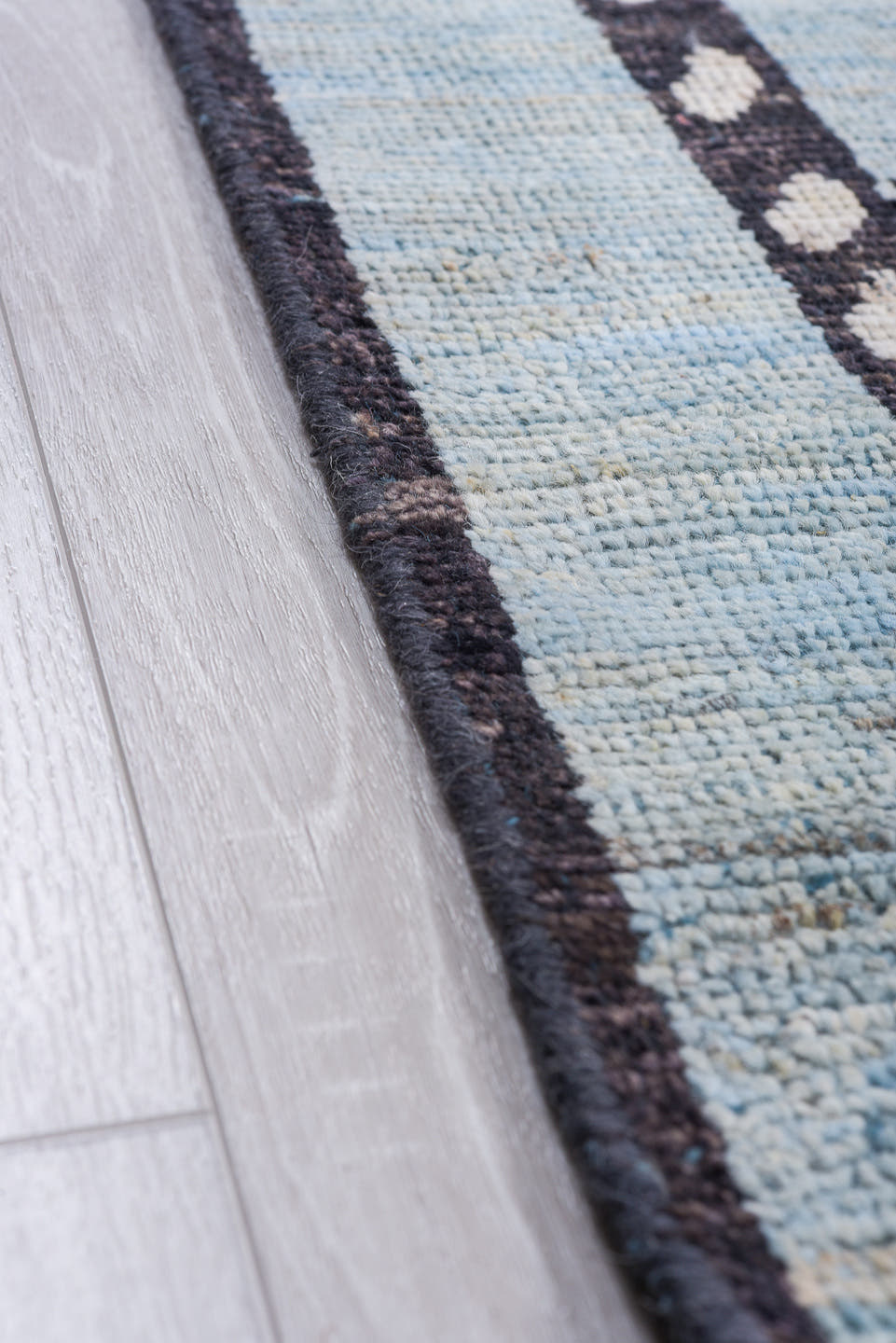 9' x 12' one-of-a-kind handmade vintage Tulu large size rug. Color palette: sky blue, charcoal, ivory, slate, light blue