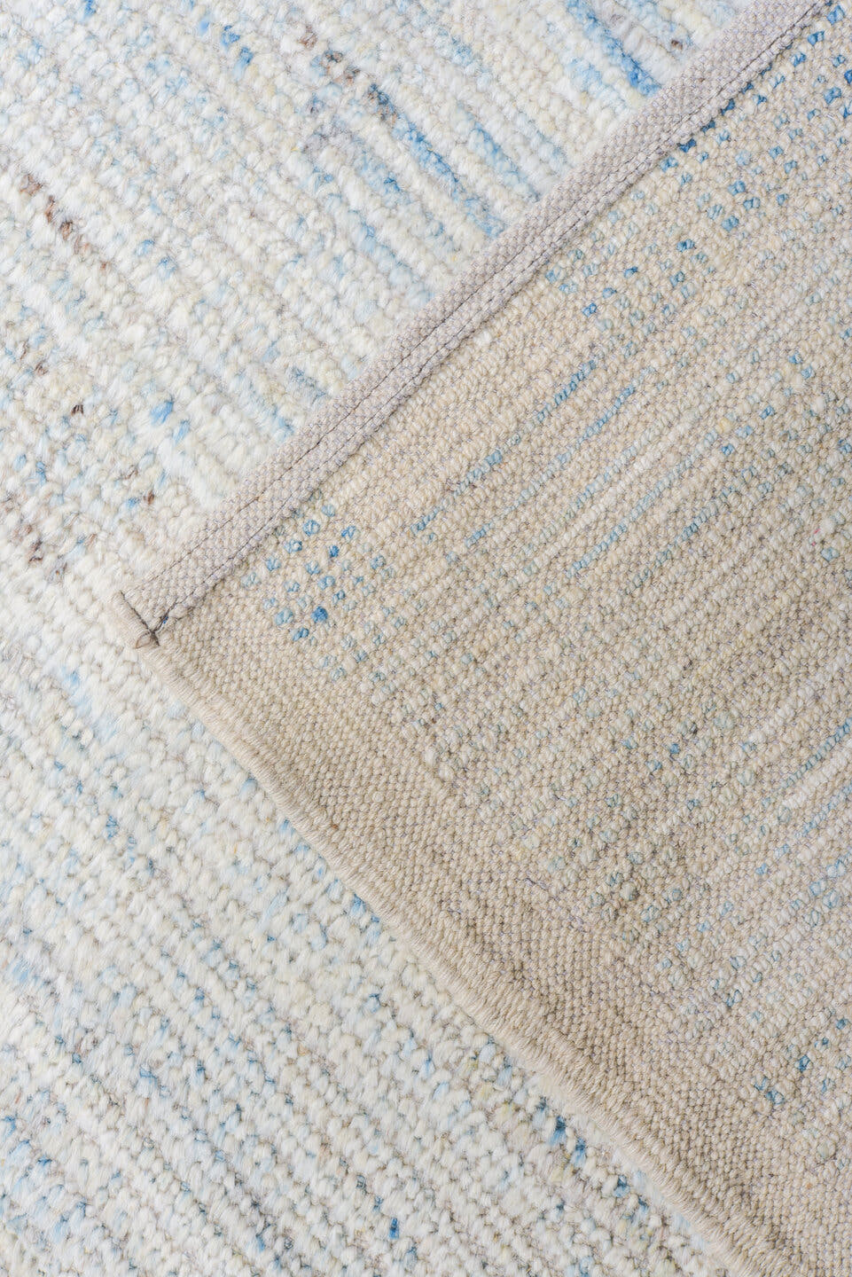 13' x 16' one-of-a-kind handmade vintage Tulu oversize rug. Color palette: ivory, pale blue, sky blue, cream, light blue