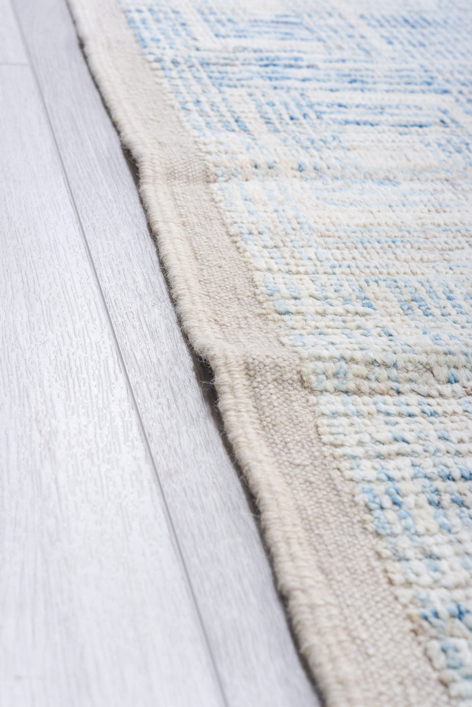 13' x 16' one-of-a-kind handmade vintage Tulu oversize rug. Color palette: ivory, pale blue, sky blue, cream, light blue