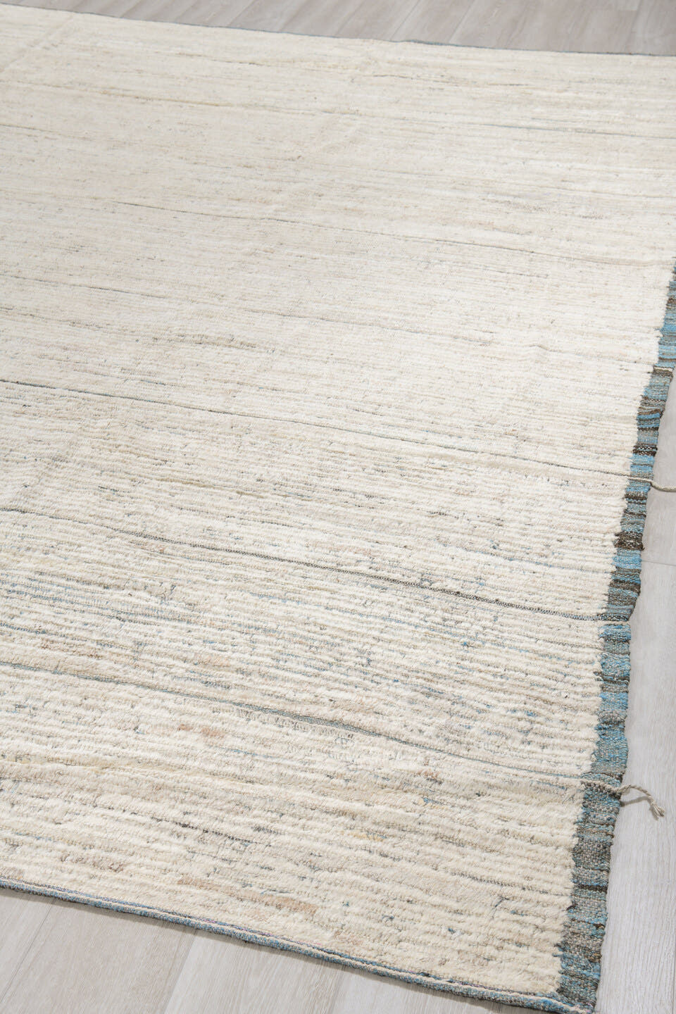 11' x 12' one-of-a-kind handmade vintage Tulu oversize rug. Color palette: ivory, charcoal, slate, cream, gray, black