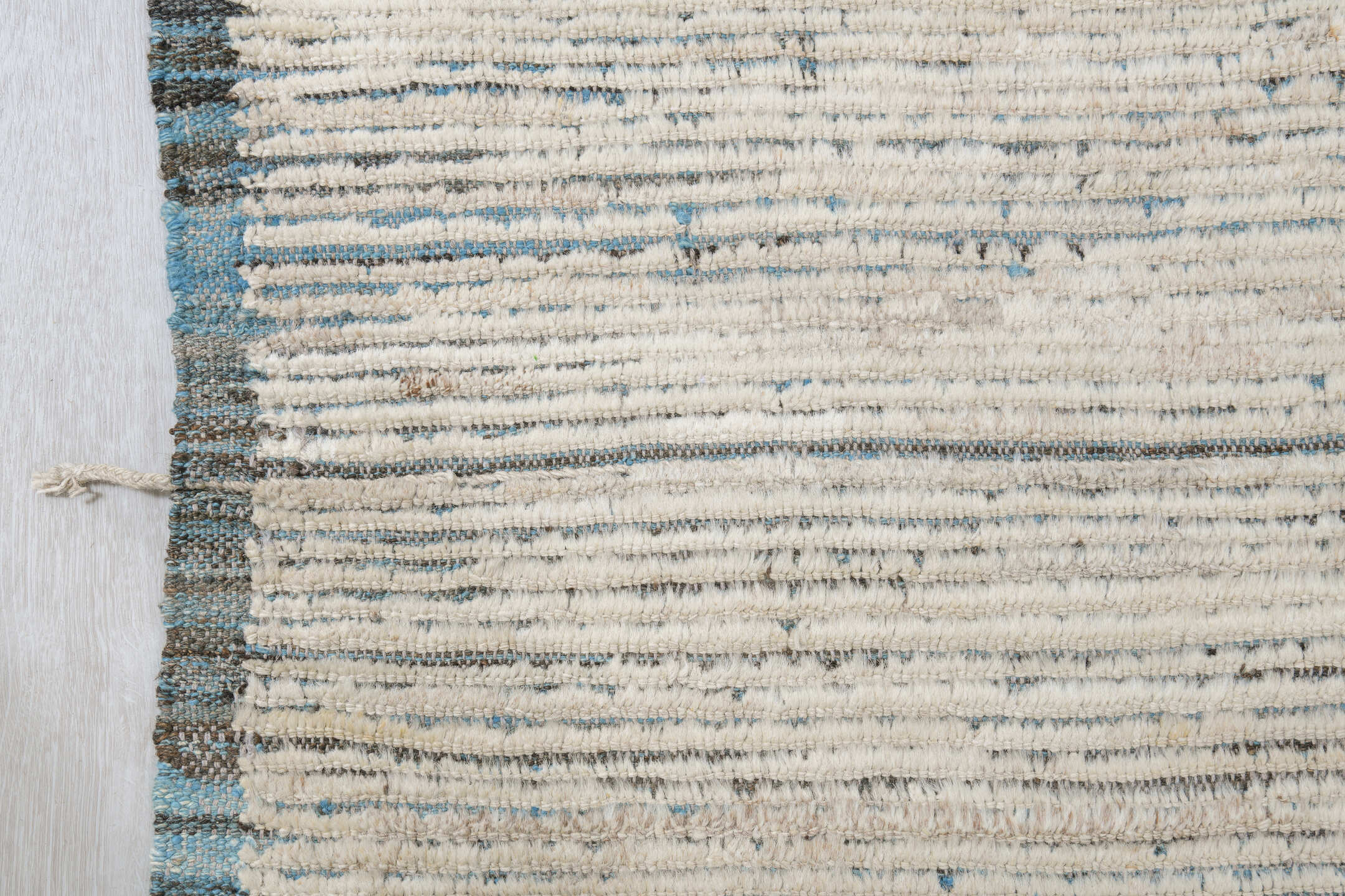 11' x 12' one-of-a-kind handmade vintage Tulu oversize rug. Color palette: ivory, charcoal, slate, cream, gray, black