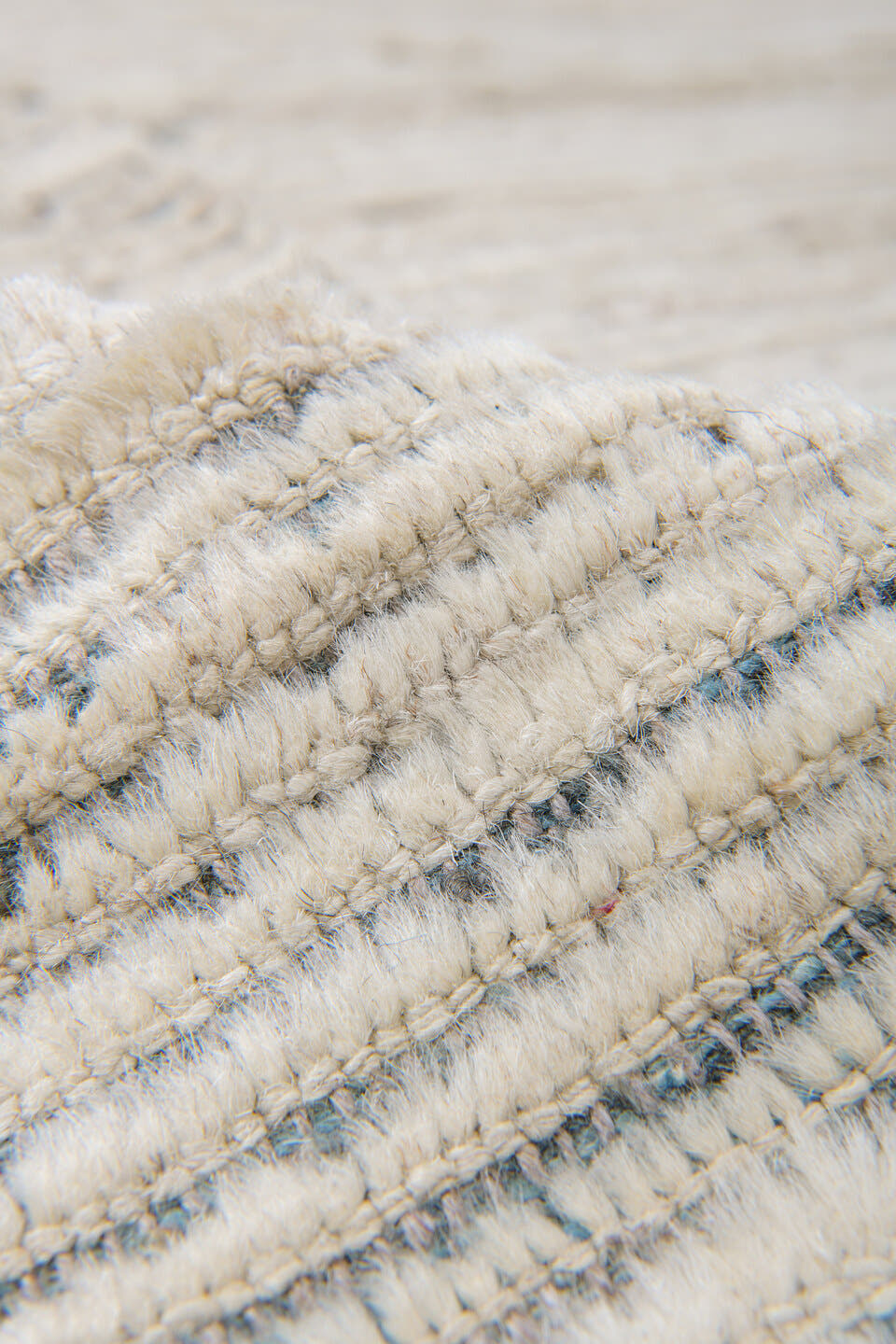 11' x 12' one-of-a-kind handmade vintage Tulu oversize rug. Color palette: ivory, charcoal, slate, cream, gray, black