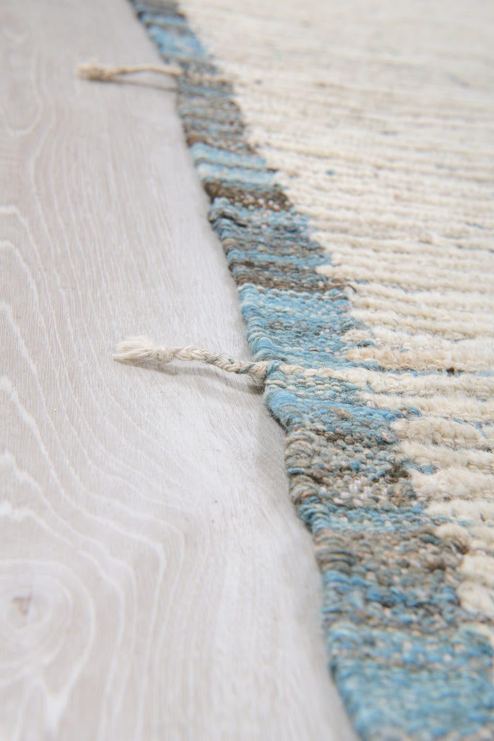 11' x 12' one-of-a-kind handmade vintage Tulu oversize rug. Color palette: ivory, charcoal, slate, cream, gray, black