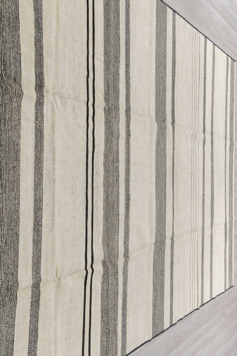 8' x 12' one-of-a-kind handmade vintage Tulu large size rug. Color palette: ivory, charcoal, cream, taupe, black, gray