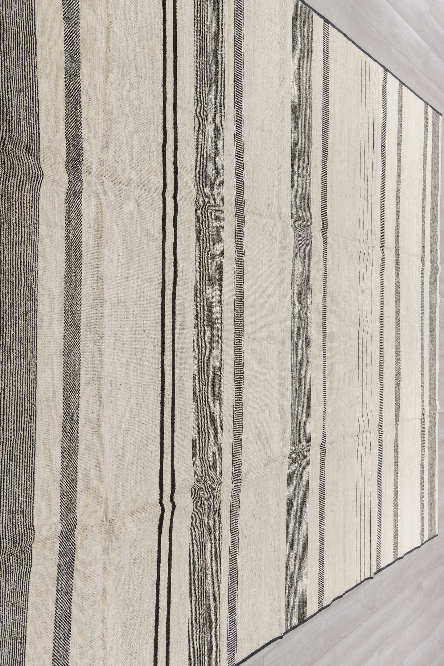 8' x 12' one-of-a-kind handmade vintage Tulu large size rug. Color palette: ivory, charcoal, cream, taupe, black, gray