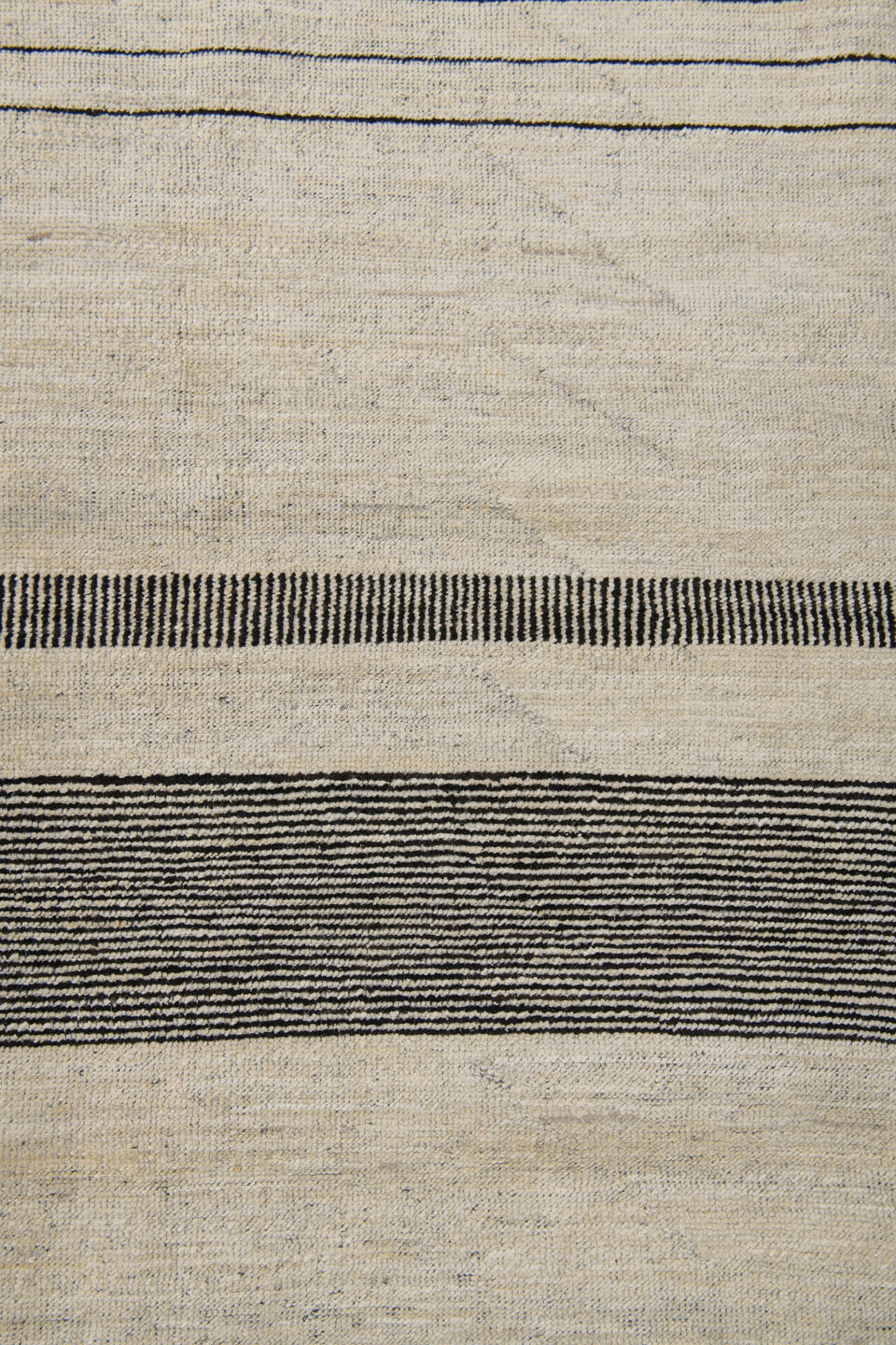 8' x 12' one-of-a-kind handmade vintage Tulu large size rug. Color palette: ivory, charcoal, cream, taupe, black, gray