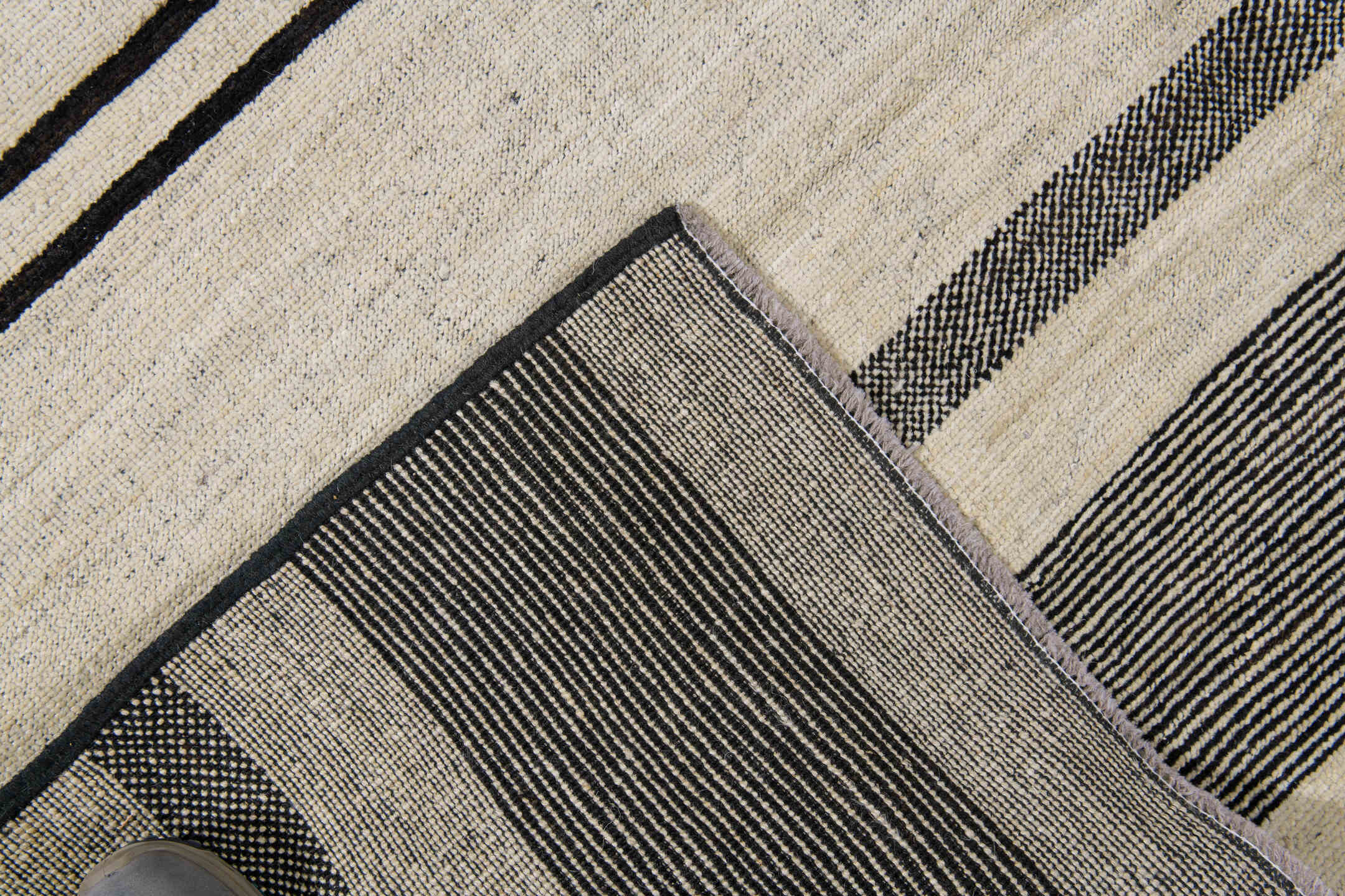 8' x 12' one-of-a-kind handmade vintage Tulu large size rug. Color palette: ivory, charcoal, cream, taupe, black, gray