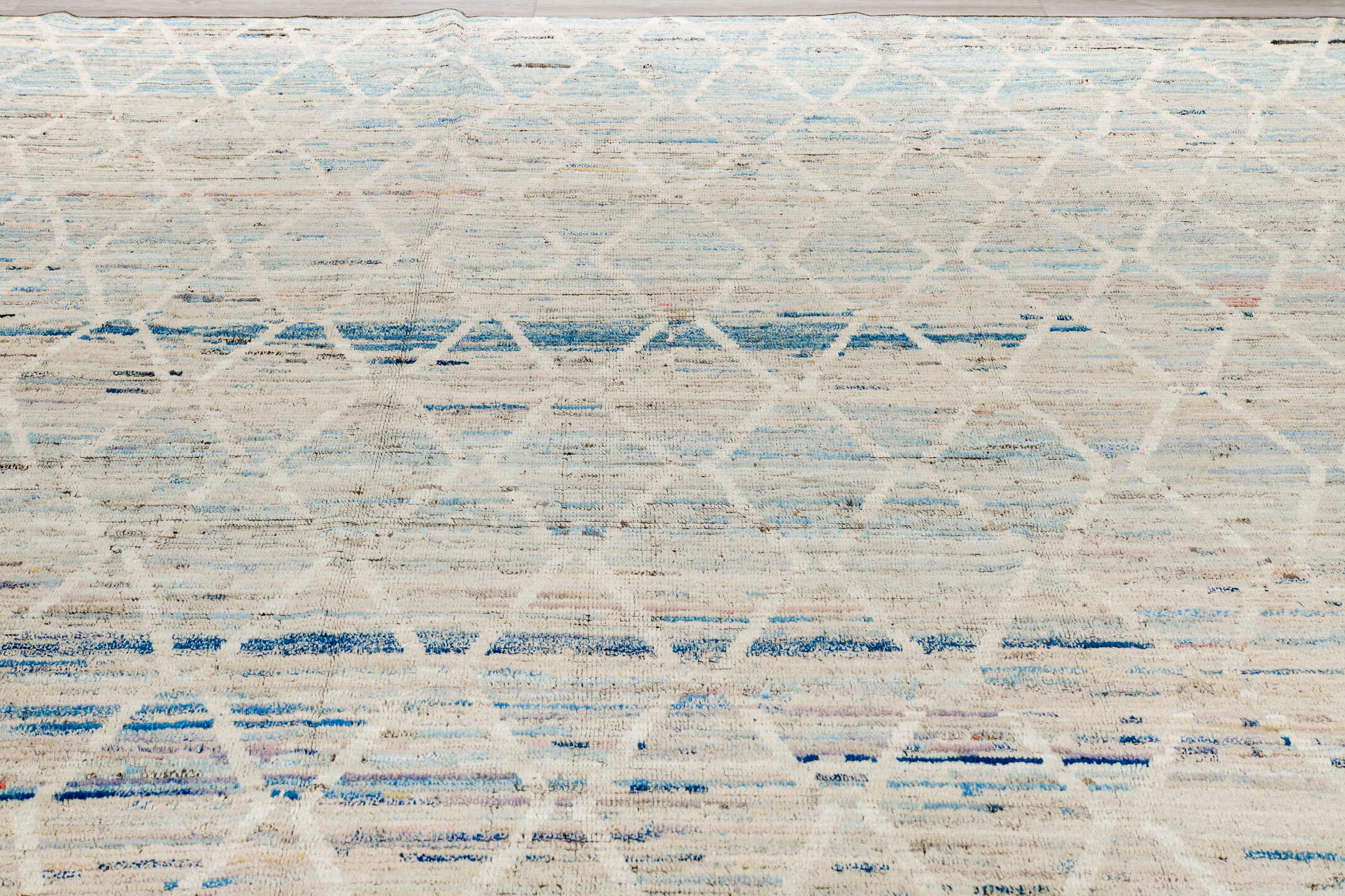 11' x 14' one-of-a-kind handmade vintage Tulu oversize rug. Color palette: beige, blue, brown, gray, light blue, light gray