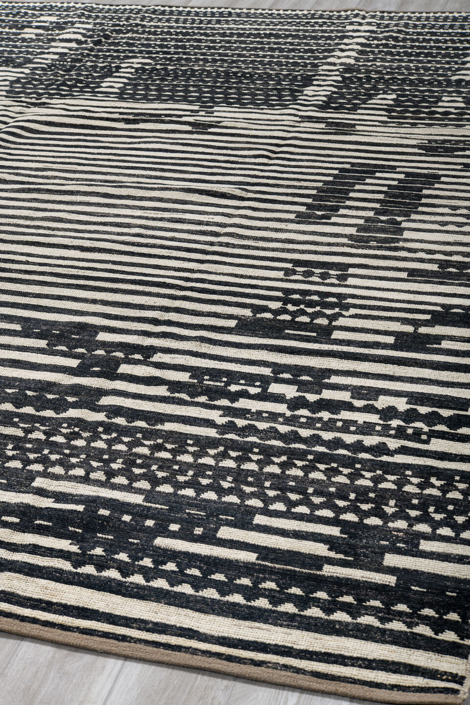9' x 11' one-of-a-kind handmade vintage Tulu large size rug. Color palette: ivory, charcoal, black, taupe, gray, beige