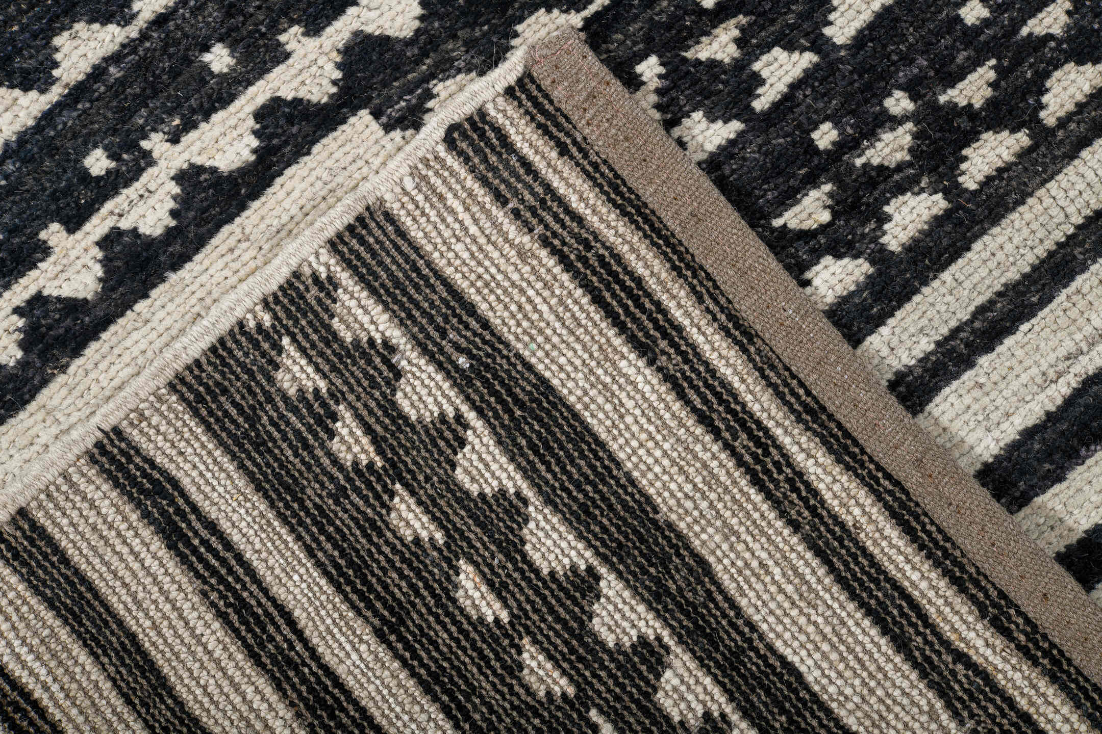 9' x 11' one-of-a-kind handmade vintage Tulu large size rug. Color palette: ivory, charcoal, black, taupe, gray, beige