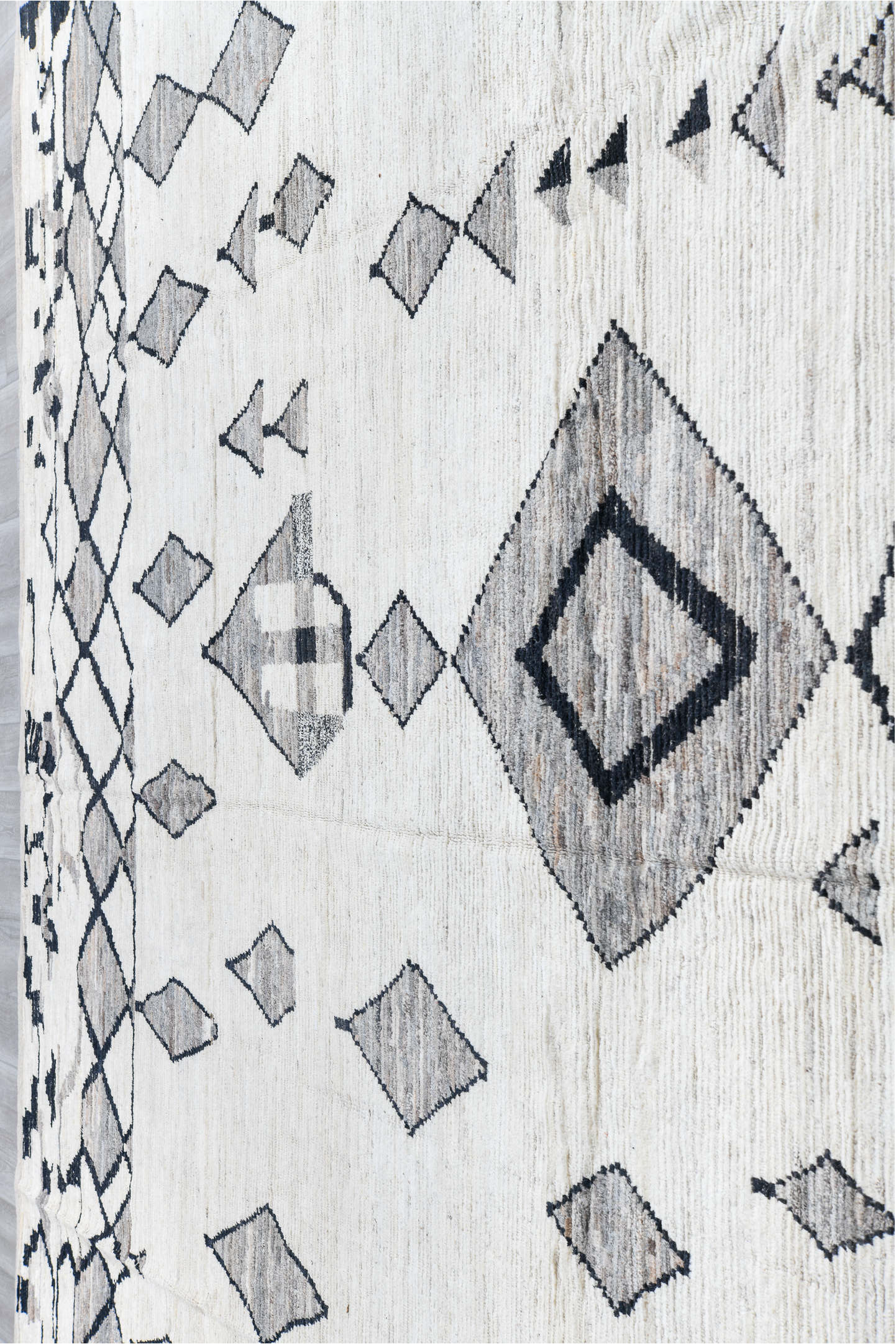 12' x 14' one-of-a-kind handmade vintage Tulu oversize rug. Color palette: ivory, charcoal, gray, black