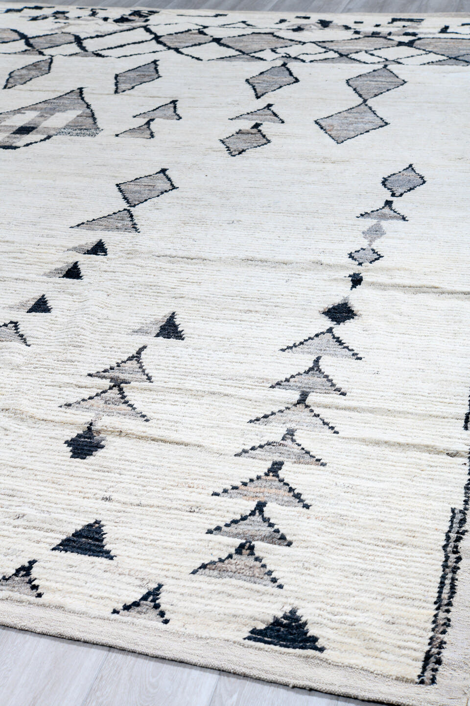 12' x 14' one-of-a-kind handmade vintage Tulu oversize rug. Color palette: ivory, charcoal, gray, black