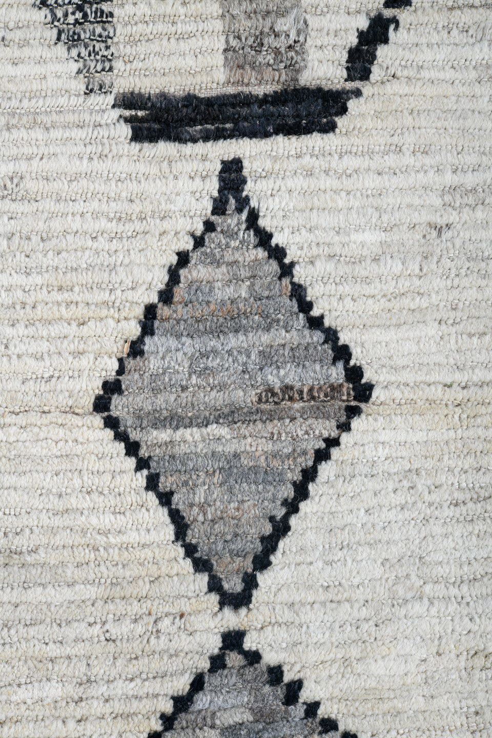 12' x 14' one-of-a-kind handmade vintage Tulu oversize rug. Color palette: ivory, charcoal, gray, black