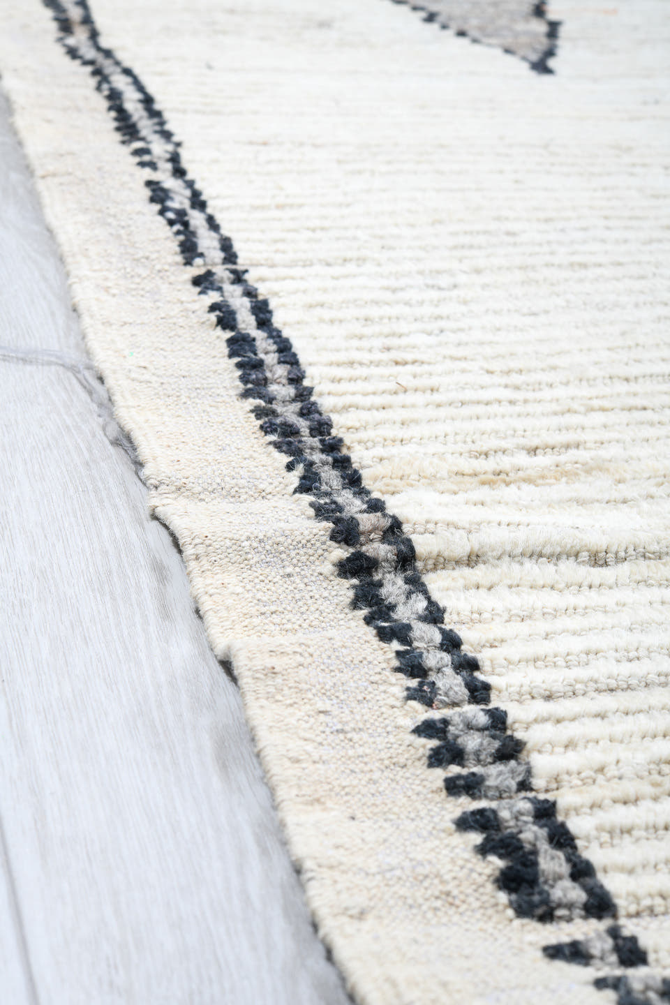12' x 14' one-of-a-kind handmade vintage Tulu oversize rug. Color palette: ivory, charcoal, gray, black