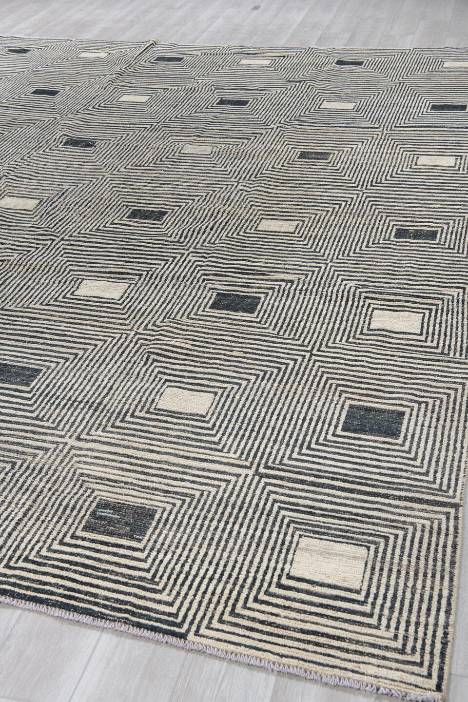10' x 13' one-of-a-kind handmade vintage Tulu large size rug. Color palette: ivory, charcoal, black, cream, taupe, gray