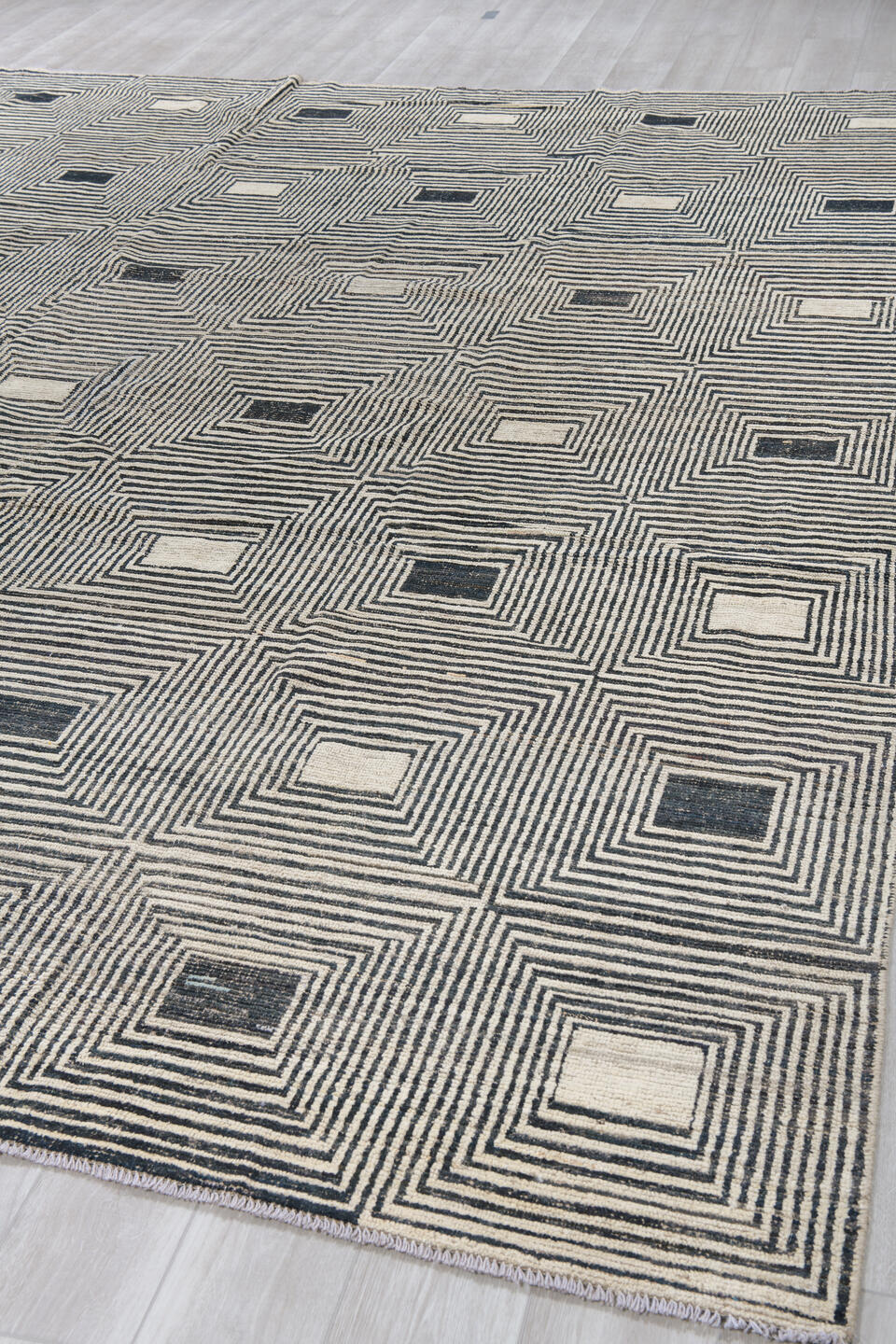 10' x 13' one-of-a-kind handmade vintage Tulu large size rug. Color palette: ivory, charcoal, black, cream, taupe, gray