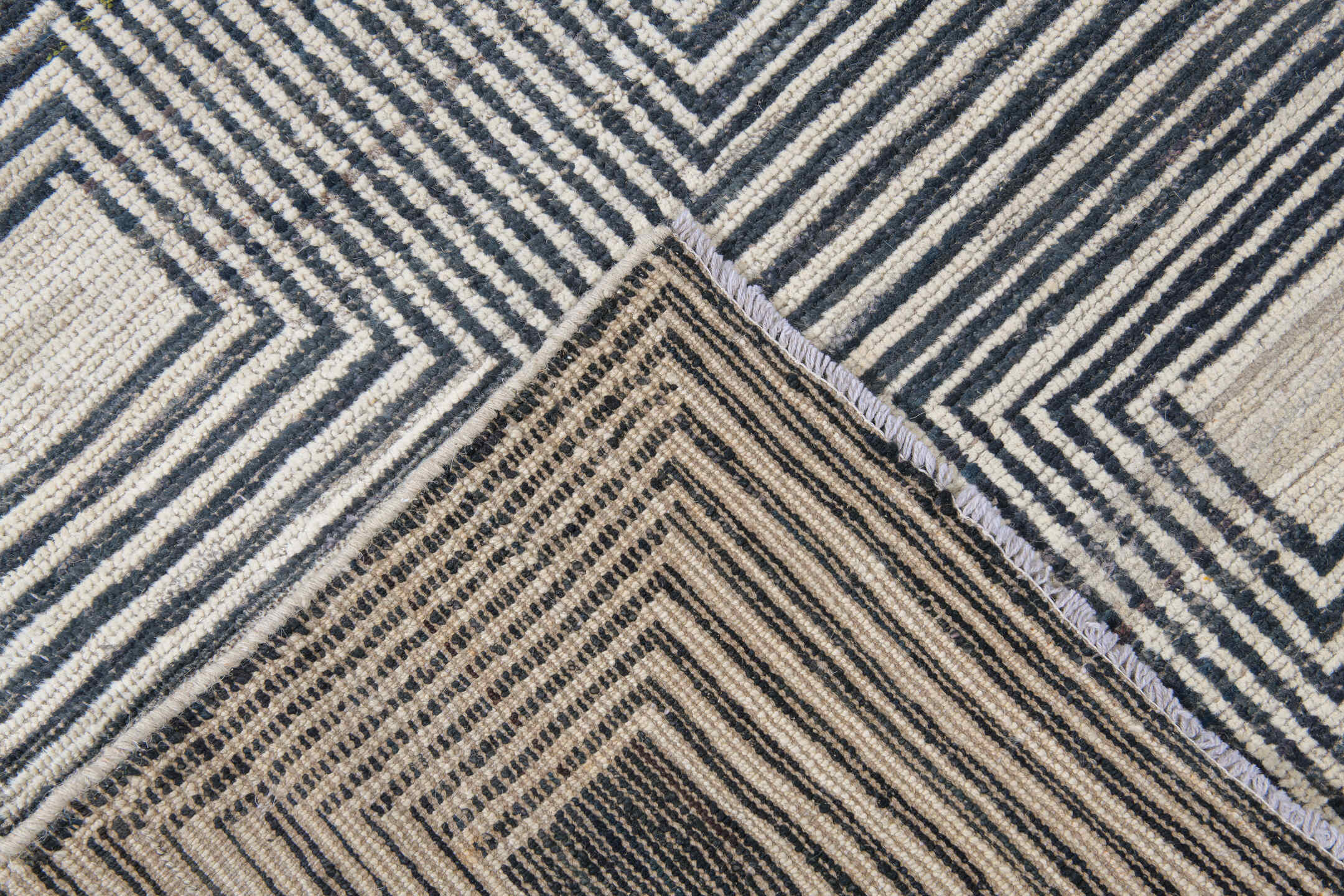 10' x 13' one-of-a-kind handmade vintage Tulu large size rug. Color palette: ivory, charcoal, black, cream, taupe, gray