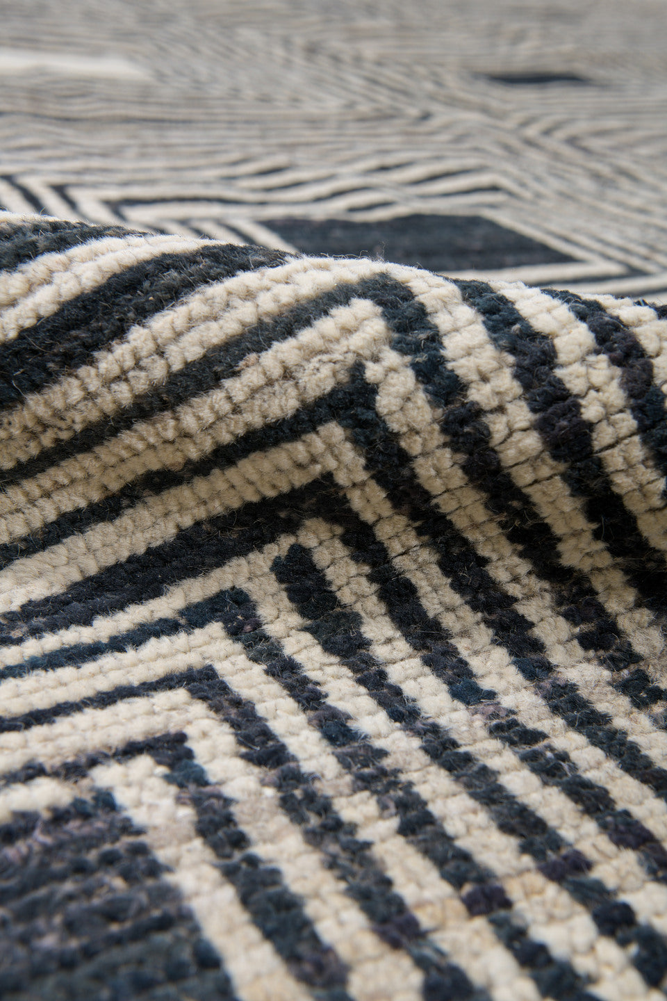 10' x 13' one-of-a-kind handmade vintage Tulu large size rug. Color palette: ivory, charcoal, black, cream, taupe, gray