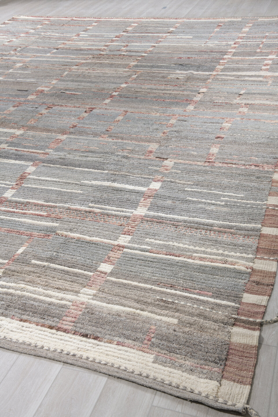 12' x 16' one-of-a-kind handmade vintage Tulu oversize rug. Color palette: gray, ivory, rose, charcoal, taupe, brown, pink