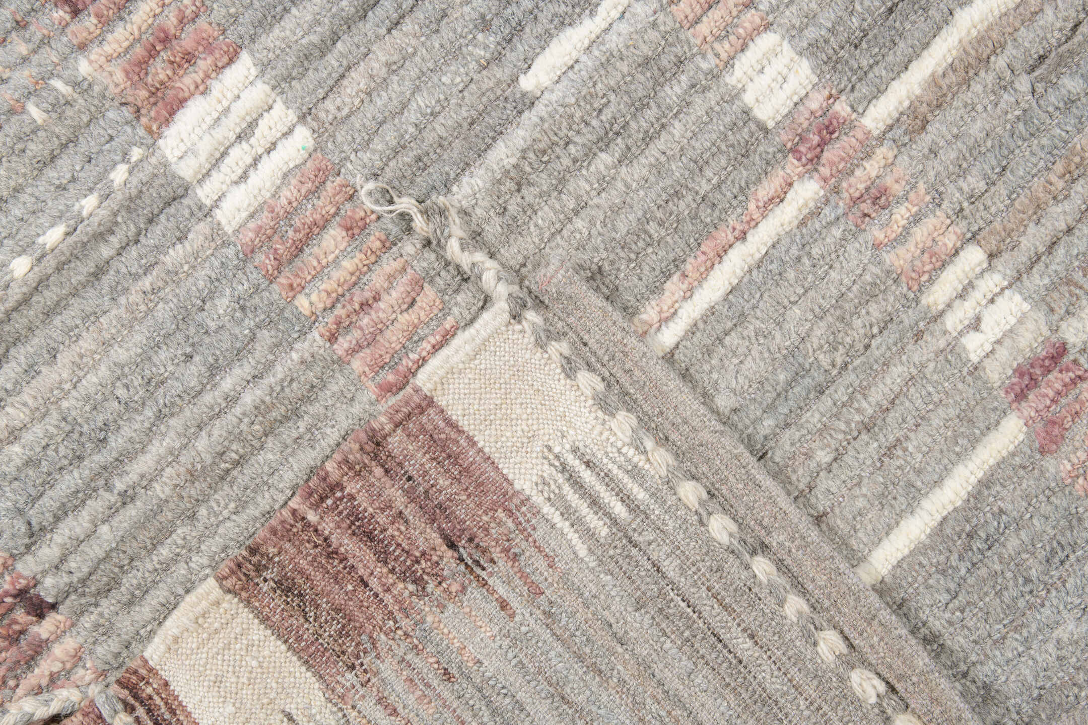 12' x 16' one-of-a-kind handmade vintage Tulu oversize rug. Color palette: gray, ivory, rose, charcoal, taupe, brown, pink
