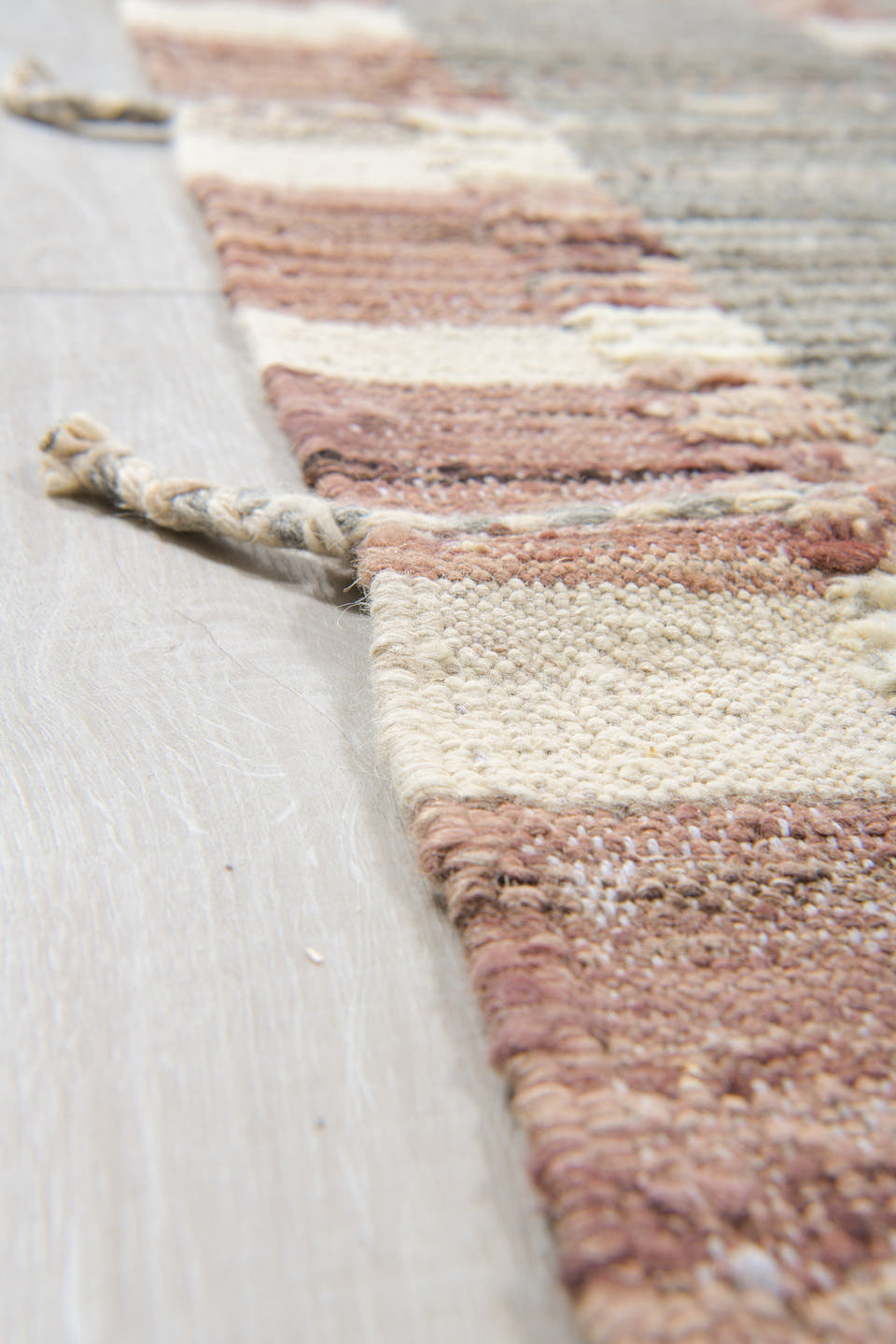 12' x 16' one-of-a-kind handmade vintage Tulu oversize rug. Color palette: gray, ivory, rose, charcoal, taupe, brown, pink