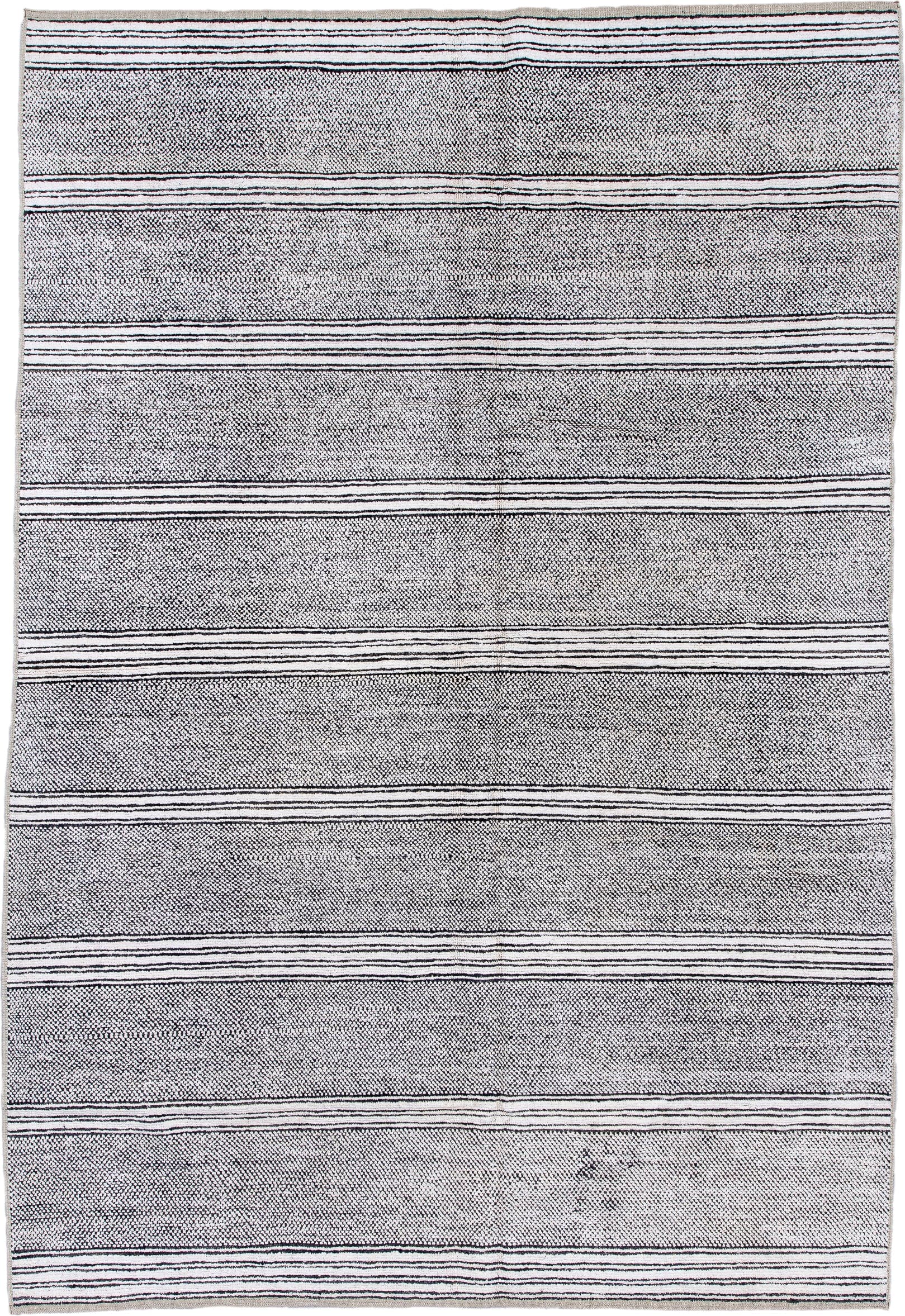 6' x 9' one-of-a-kind handmade vintage Tulu medium size rug. Color palette: ivory, charcoal, gray, black