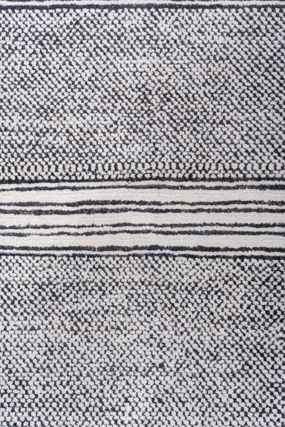 6' x 9' one-of-a-kind handmade vintage Tulu medium size rug. Color palette: ivory, charcoal, gray, black
