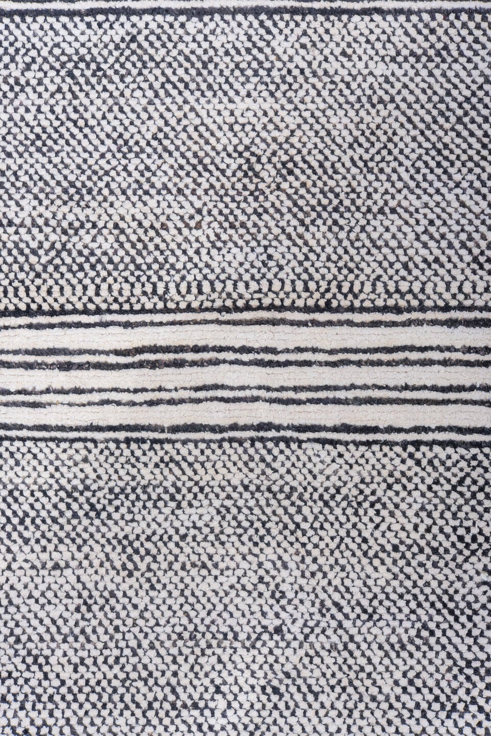6' x 9' one-of-a-kind handmade vintage Tulu medium size rug. Color palette: ivory, charcoal, gray, black