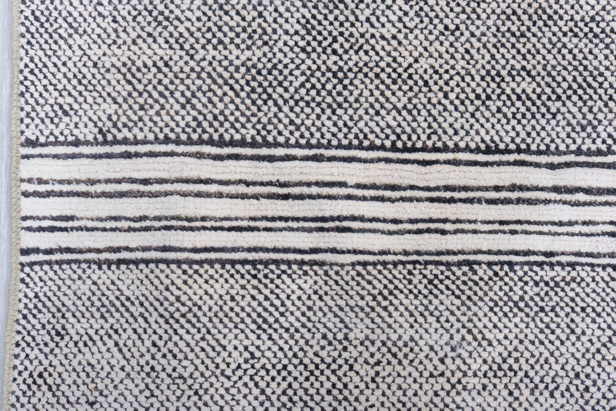 6' x 9' one-of-a-kind handmade vintage Tulu medium size rug. Color palette: ivory, charcoal, gray, black