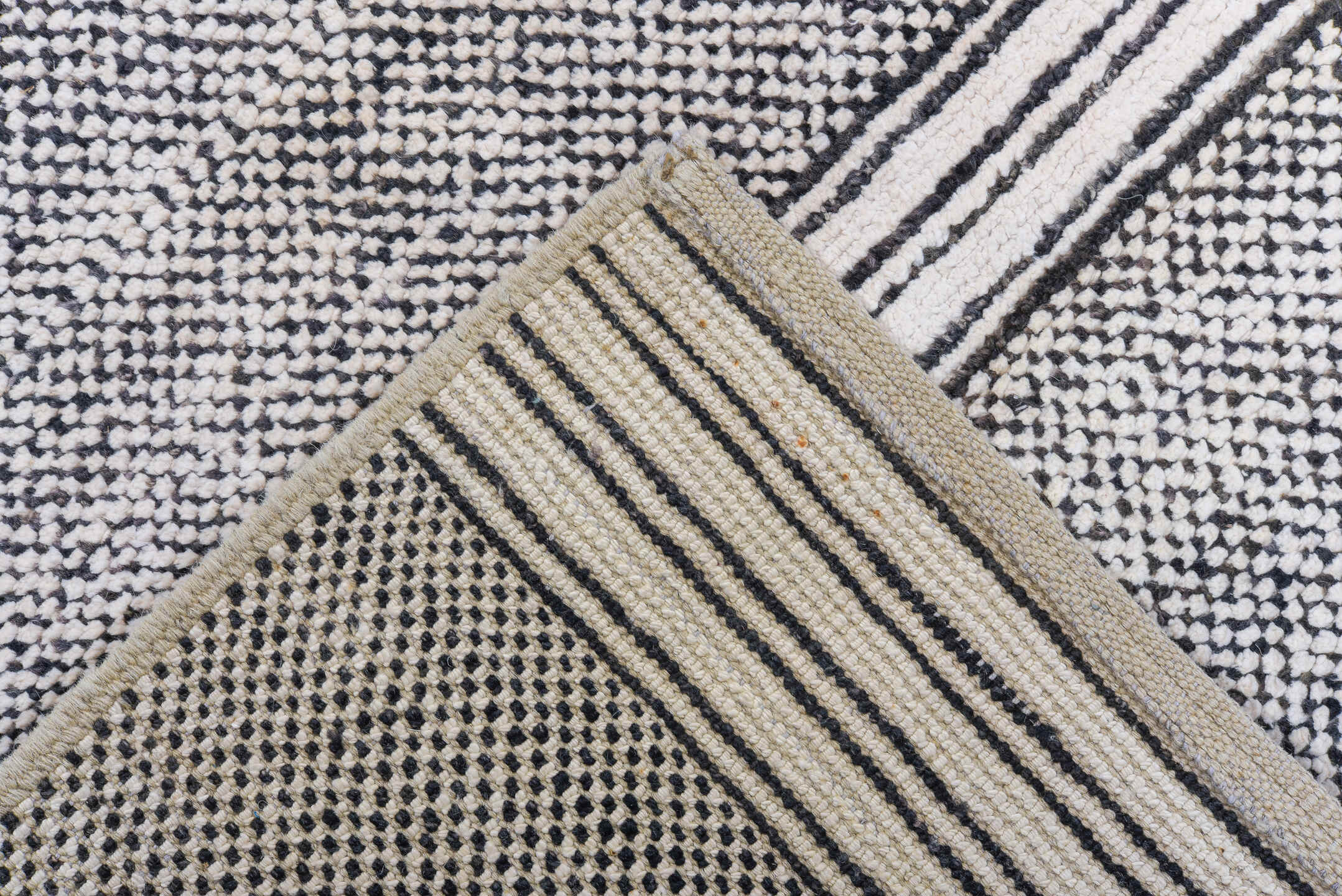 6' x 9' one-of-a-kind handmade vintage Tulu medium size rug. Color palette: ivory, charcoal, gray, black