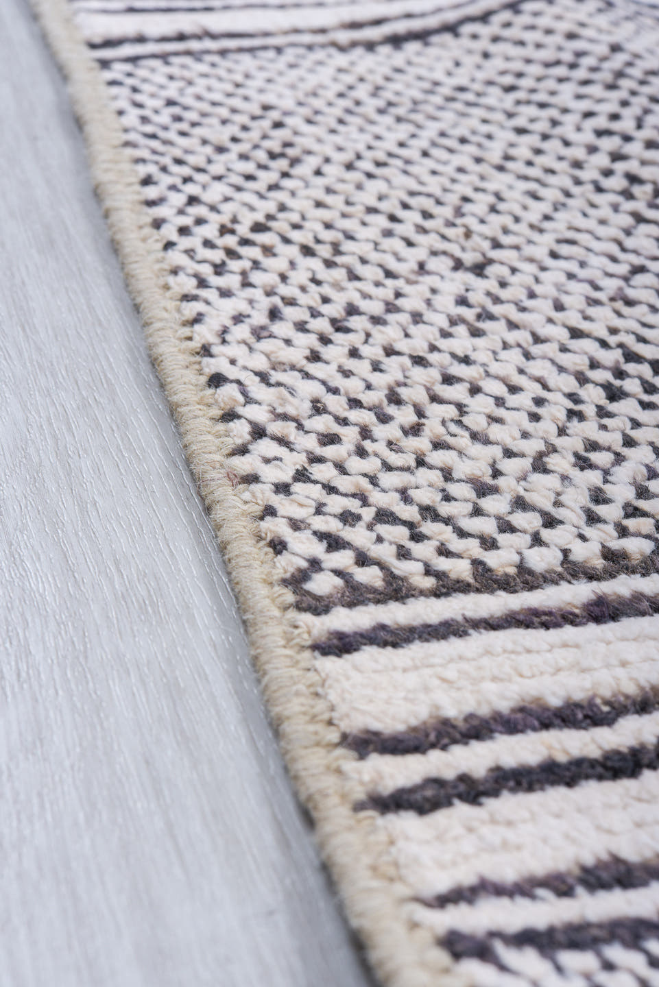 6' x 9' one-of-a-kind handmade vintage Tulu medium size rug. Color palette: ivory, charcoal, gray, black