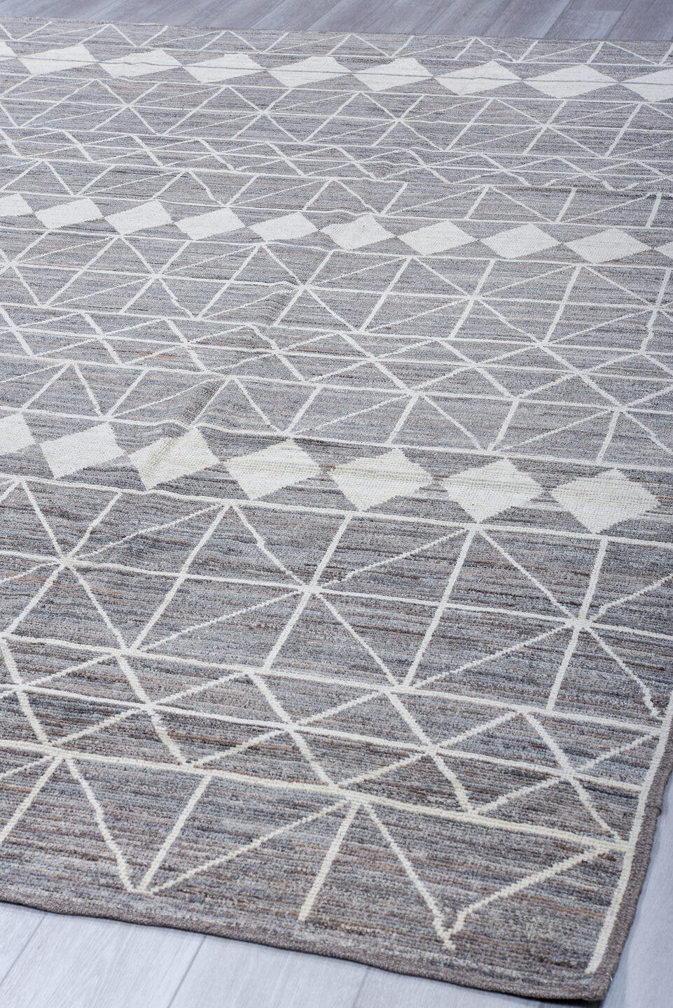 9' x 12' one-of-a-kind handmade vintage Tulu large size rug. Color palette: gray, ivory, taupe, charcoal, beige, black