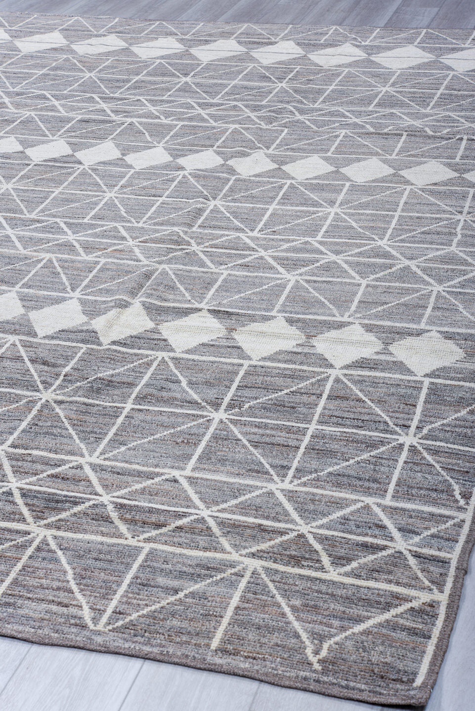 9' x 12' one-of-a-kind handmade vintage Tulu large size rug. Color palette: gray, ivory, taupe, charcoal, beige, black