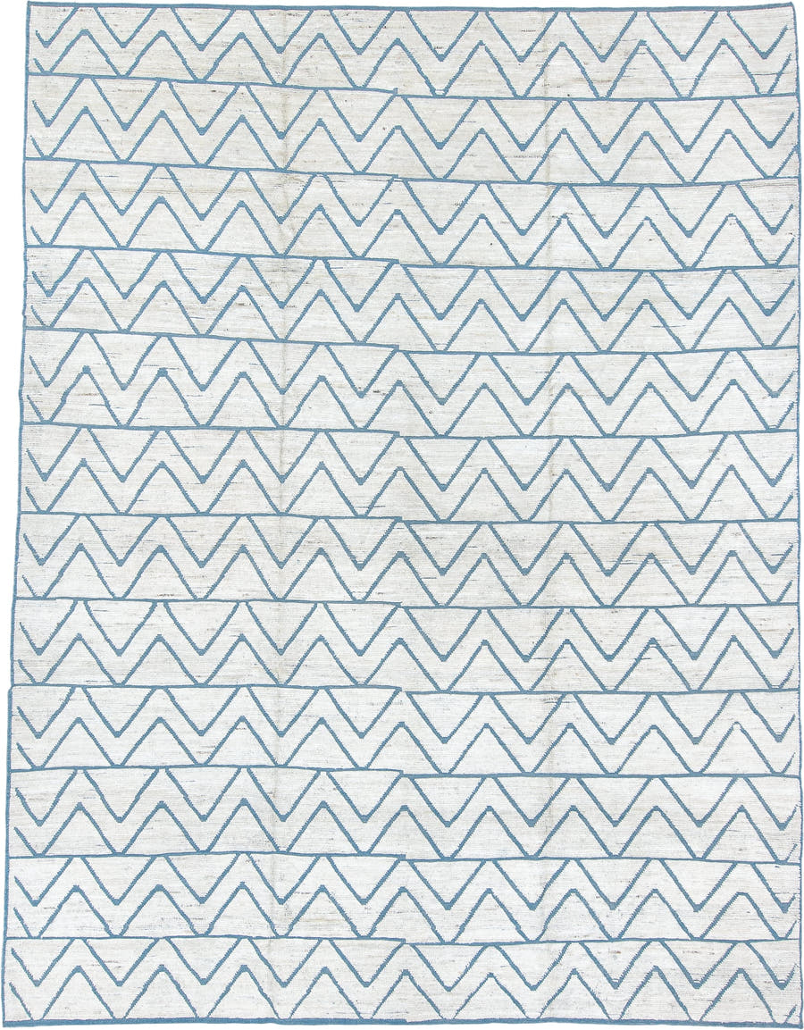 9' x 12' one-of-a-kind handmade vintage Tulu large size rug. Color palette: ivory, sky_blue, pale_blue, light blue