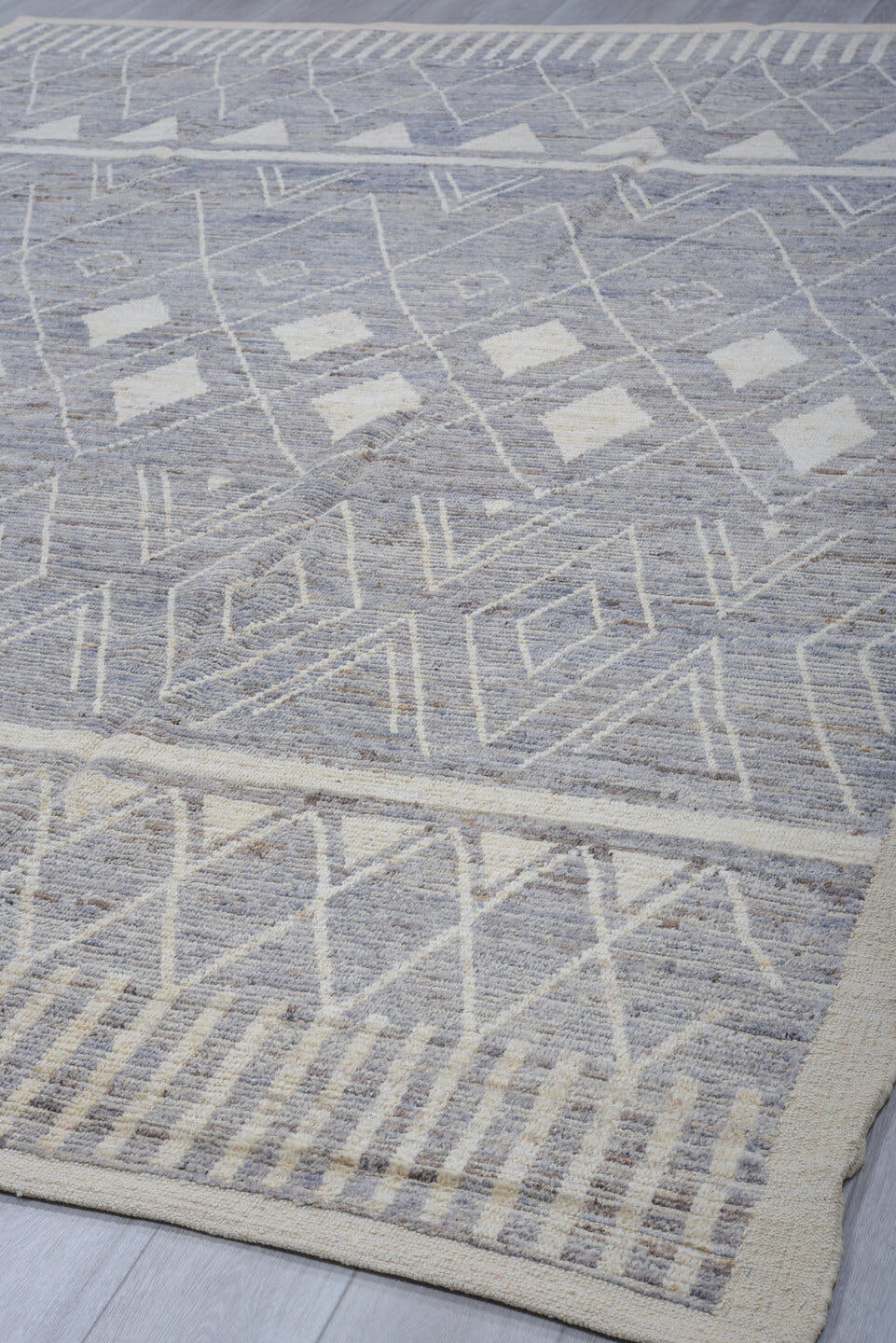 9' x 11' one-of-a-kind handmade vintage Tulu large size rug. Color palette: ivory, slate, pale blue, taupe, gray, light blue
