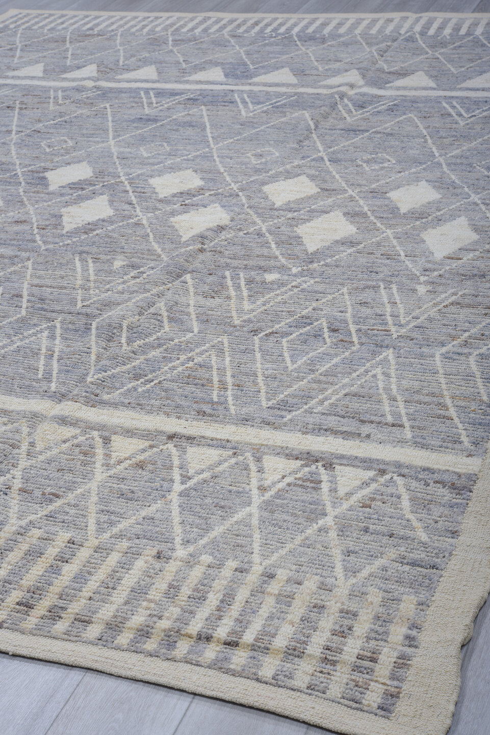 9' x 11' one-of-a-kind handmade vintage Tulu large size rug. Color palette: ivory, slate, pale blue, taupe, gray, light blue