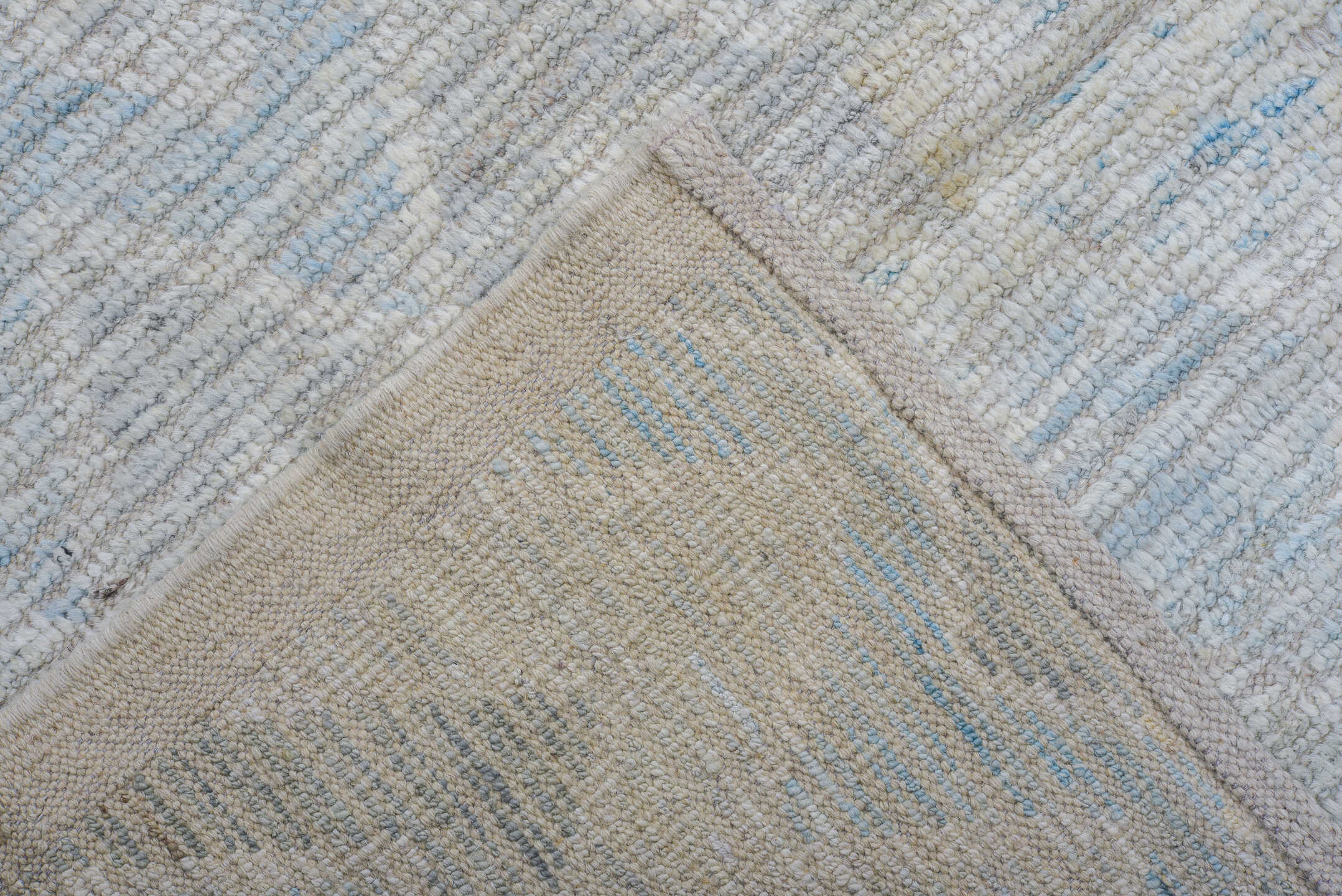 8' x 10' one-of-a-kind handmade vintage Tulu large size rug. Color palette: ivory, pale blue, light gray, cream, light blue