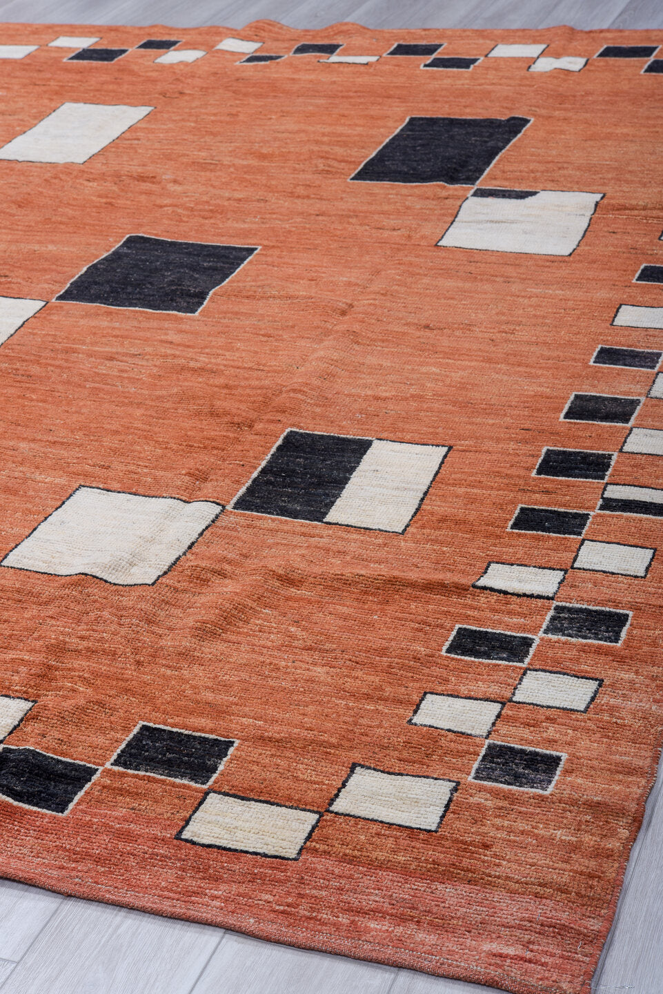 8' x 10' one-of-a-kind handmade vintage Tulu large size rug. Color palette: terra cotta, ivory, charcoal, rust, terracotta