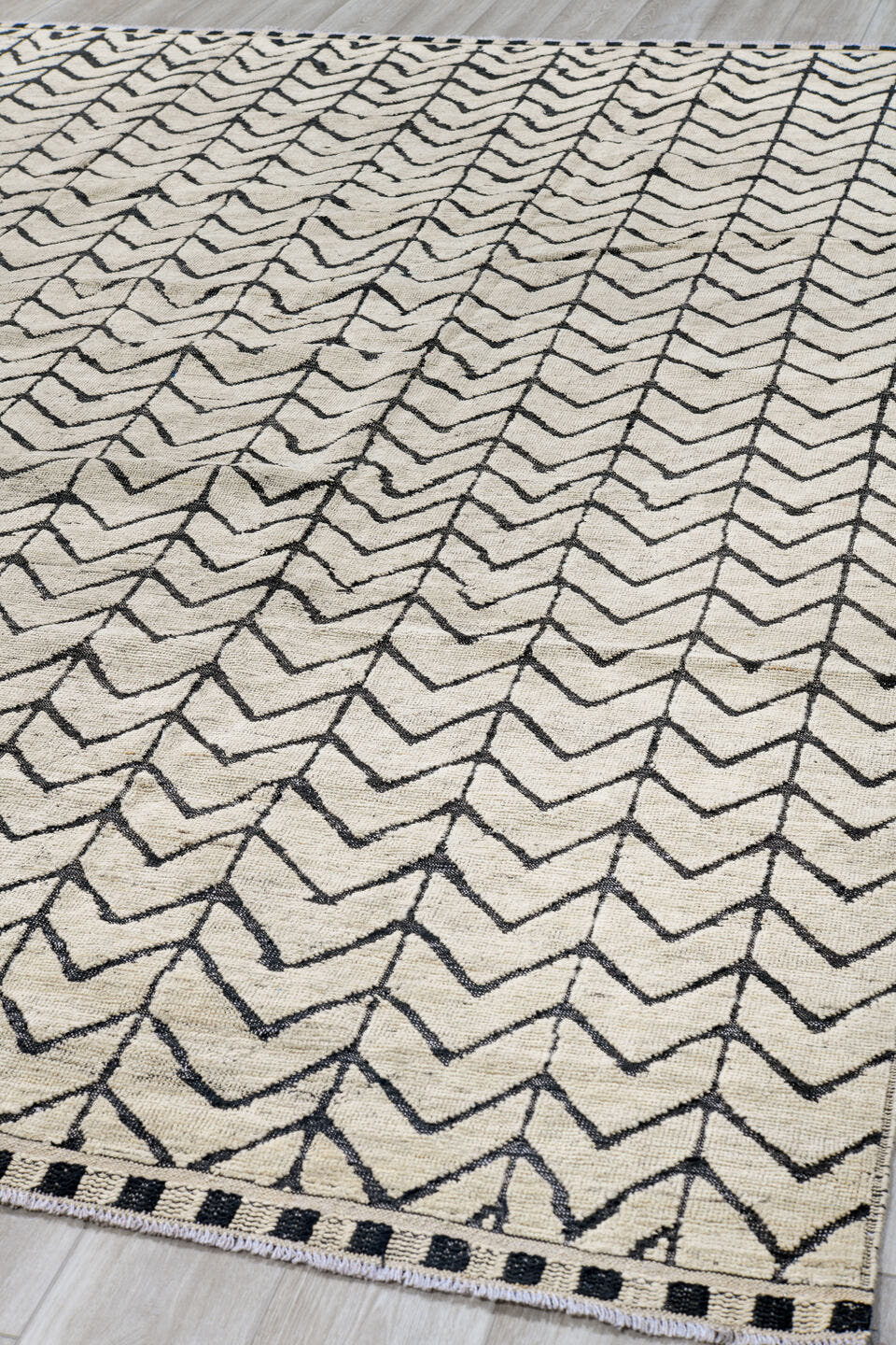 9' x 12' one-of-a-kind handmade vintage Tulu large size rug. Color palette: ivory, charcoal, gray, black