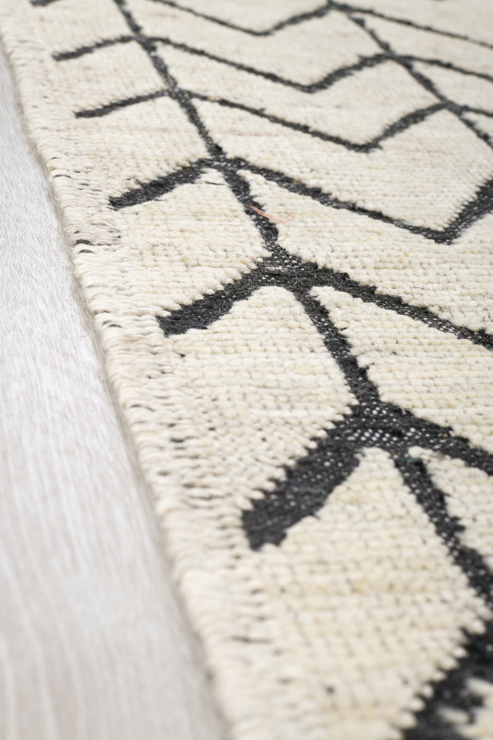 9' x 12' one-of-a-kind handmade vintage Tulu large size rug. Color palette: ivory, charcoal, gray, black