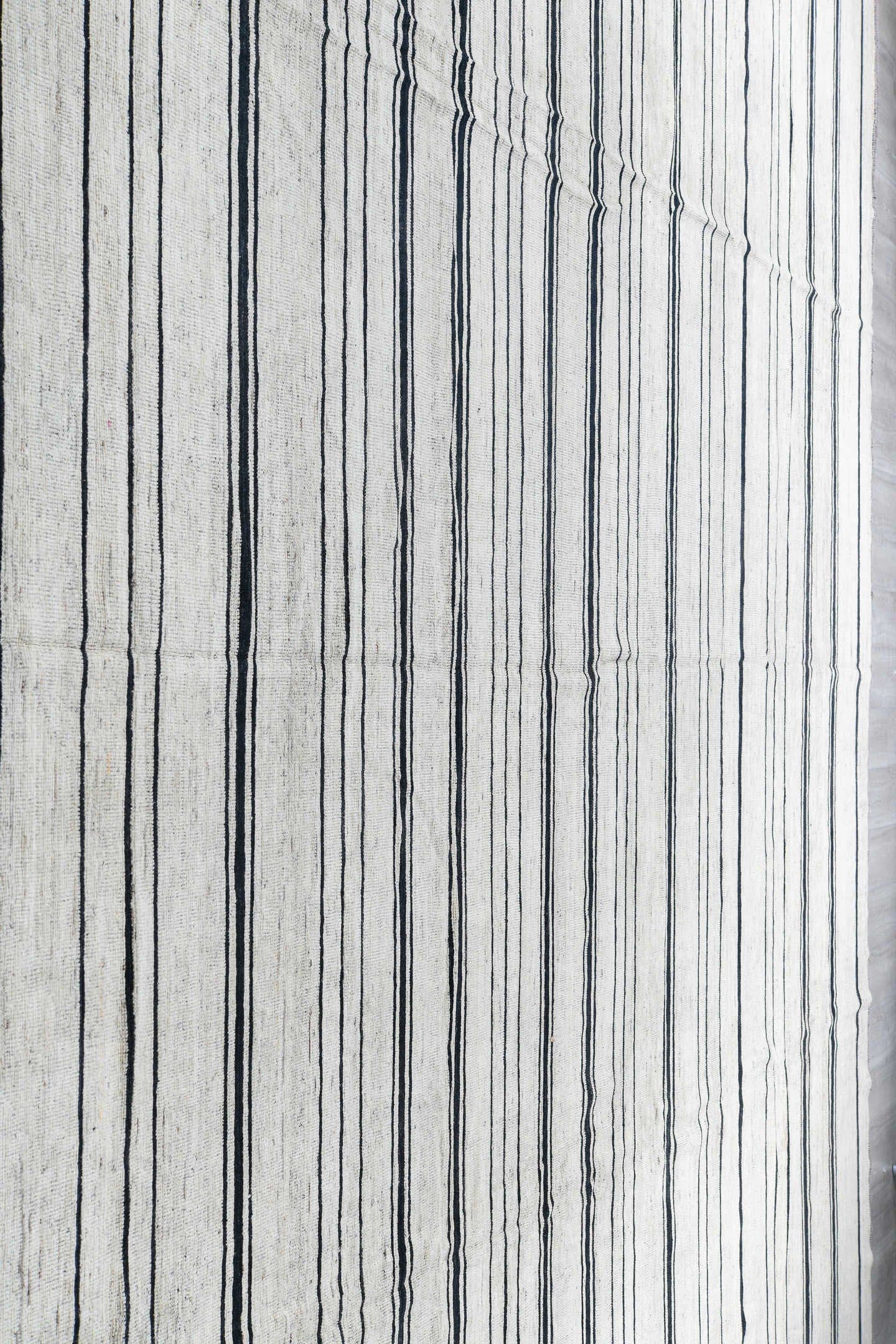 13' x 19' one-of-a-kind handmade vintage Tulu oversize rug. Color palette: ivory, charcoal, teal, taupe, gray, black, beige