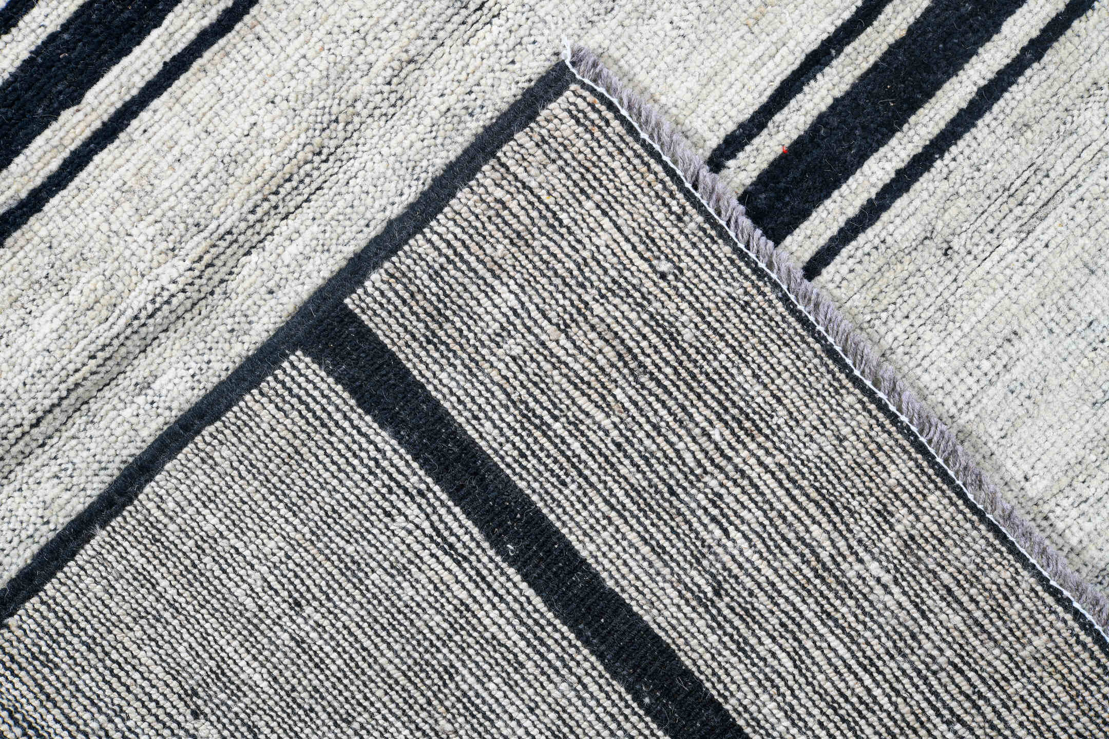 13' x 19' one-of-a-kind handmade vintage Tulu oversize rug. Color palette: ivory, charcoal, teal, taupe, gray, black, beige