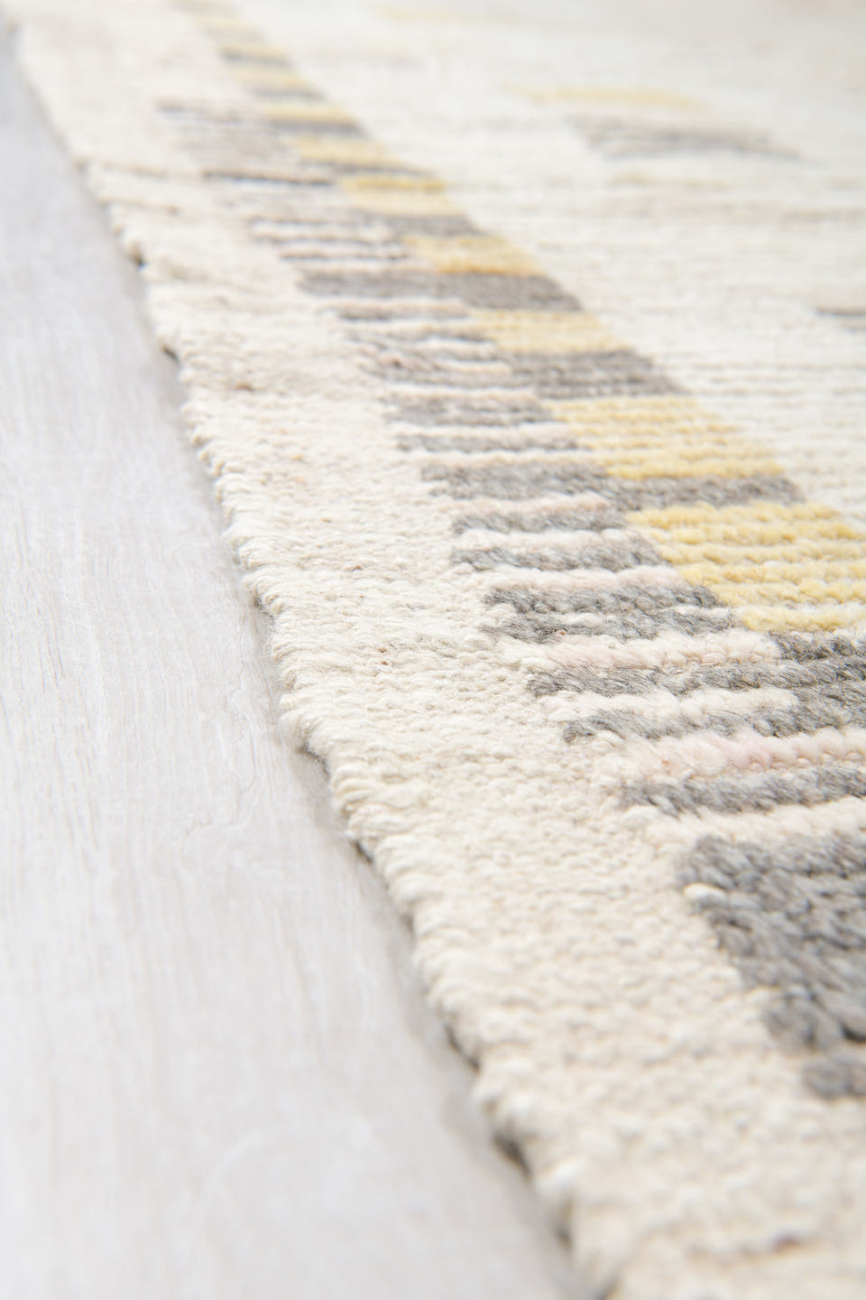 12' x 16' one-of-a-kind handmade vintage Tulu oversize rug. Color palette: ivory, charcoal, cream, pale gold, blush, taupe